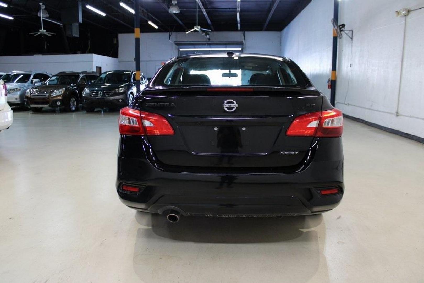 2018 Super Black /Charcoal Nissan Sentra SR (3N1AB7AP8JY) with an 1.8L 4-Cylinder DOHC 16V engine, CVT transmission, located at 15300 Midway Rd., Addison, TX, 75001, (972) 702-0011, 32.958321, -96.838074 - HOME OF THE NO HAGGLE PRICE - WHOLESALE PRICES TO THE PUBLIC!! Sentra SR, 4D Sedan, 1.8L 4-Cylinder DOHC 16V, CVT with Xtronic, FWD, Super Black, Charcoal Cloth.<br><br>Super Black 2018 Nissan Sentra SR<br><br>29/37 City/Highway MPG<br><br><br>At Midway Auto Group, we strive to provide you with the - Photo#7