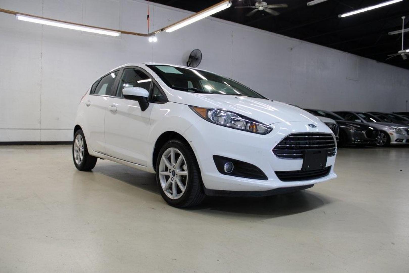 2019 White /Smoke Storm Ford Fiesta SE (3FADP4EJ2KM) with an 1.6L I4 Ti-VCT engine, Automatic transmission, located at 15300 Midway Rd., Addison, TX, 75001, (972) 702-0011, 32.958321, -96.838074 - Photo#1