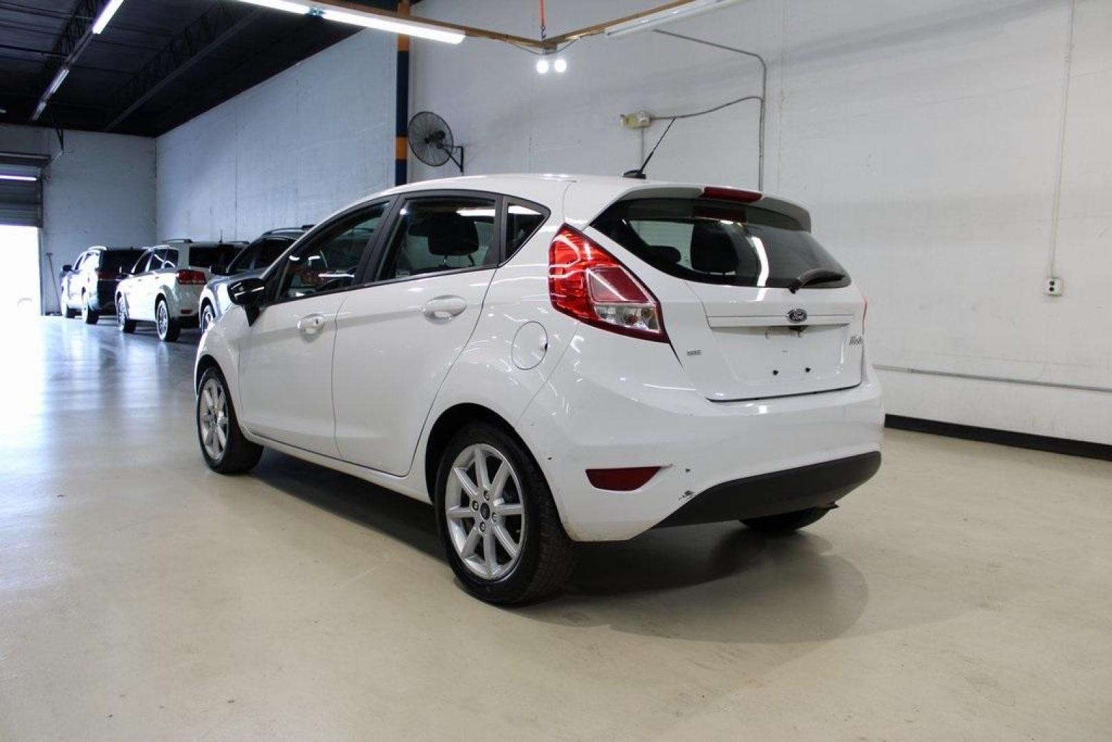 2019 White /Smoke Storm Ford Fiesta SE (3FADP4EJ2KM) with an 1.6L I4 Ti-VCT engine, Automatic transmission, located at 15300 Midway Rd., Addison, TX, 75001, (972) 702-0011, 32.958321, -96.838074 - Photo#3