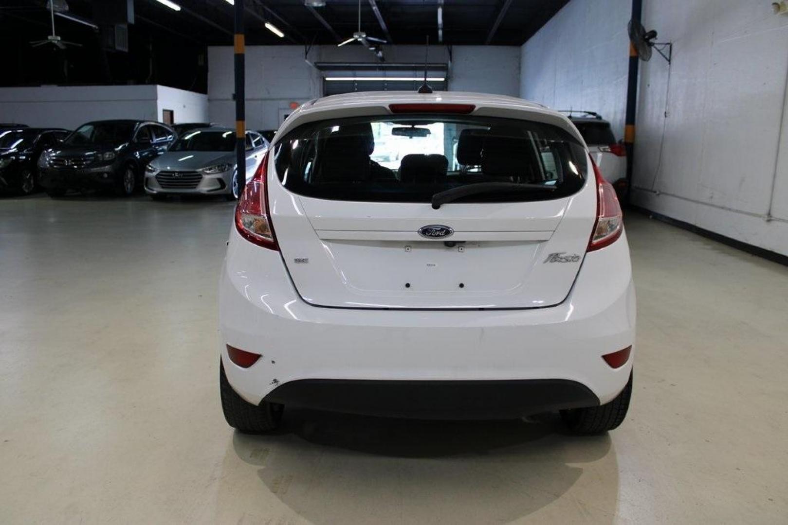 2019 White /Smoke Storm Ford Fiesta SE (3FADP4EJ2KM) with an 1.6L I4 Ti-VCT engine, Automatic transmission, located at 15300 Midway Rd., Addison, TX, 75001, (972) 702-0011, 32.958321, -96.838074 - Photo#7