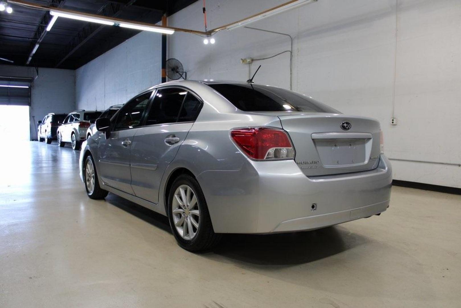 2013 Ice Silver Metallic /Black Subaru Impreza 2.0i Premium (JF1GJAB61DH) with an 2.0L 4-Cylinder SMPI DOHC 16V engine, CVT transmission, located at 15300 Midway Rd., Addison, TX, 75001, (972) 702-0011, 32.958321, -96.838074 - Photo#3