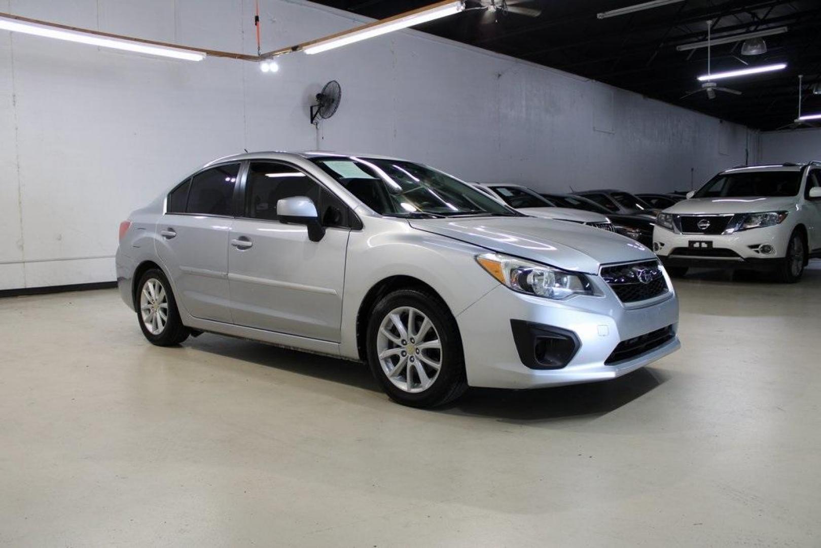 2013 Ice Silver Metallic /Black Subaru Impreza 2.0i Premium (JF1GJAB61DH) with an 2.0L 4-Cylinder SMPI DOHC 16V engine, CVT transmission, located at 15300 Midway Rd., Addison, TX, 75001, (972) 702-0011, 32.958321, -96.838074 - Photo#6