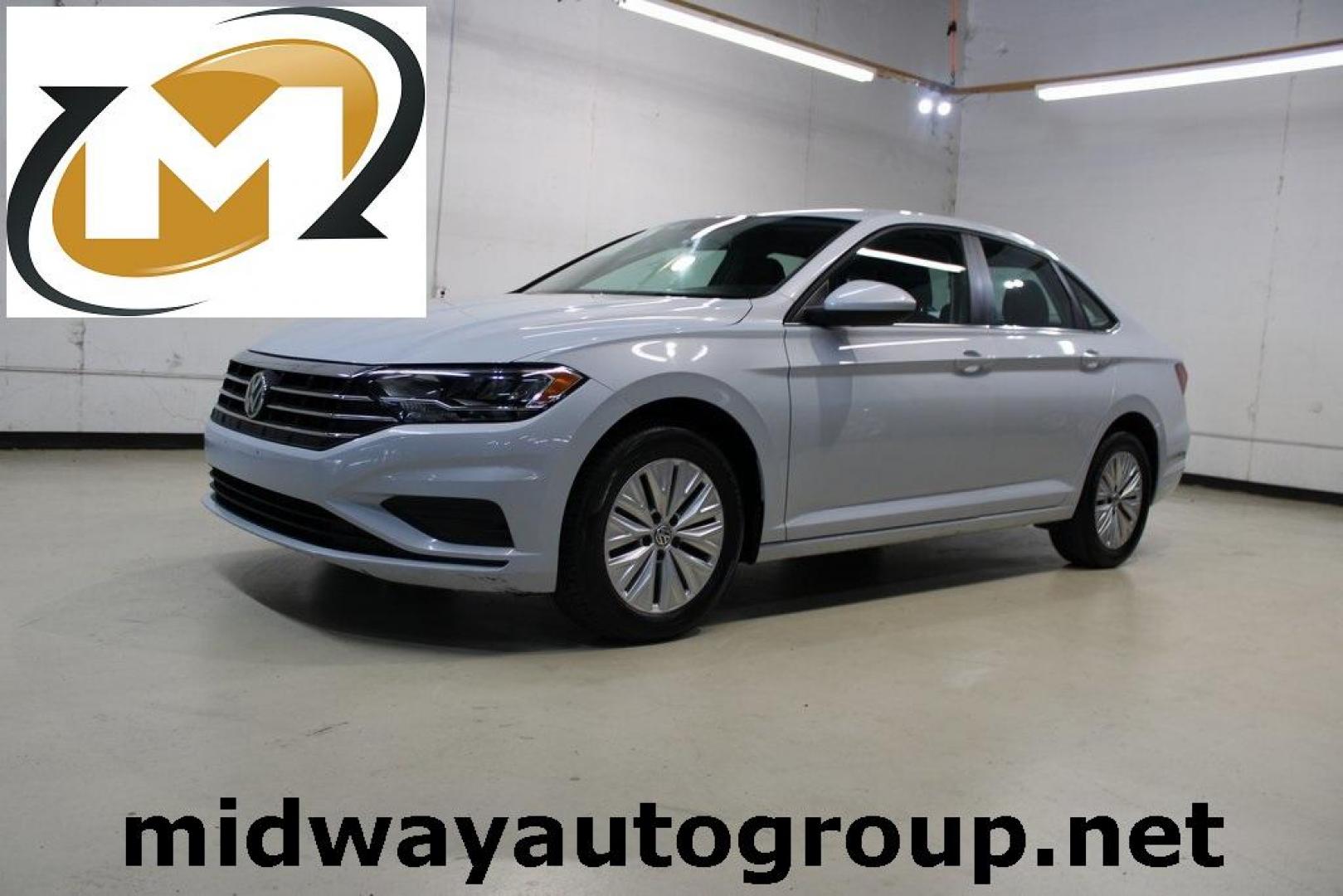 2019 Platinum Gray Metallic Volkswagen Jetta (3VWC57BU6KM) with an 1.4L TSI engine, Automatic transmission, located at 15300 Midway Rd., Addison, TX, 75001, (972) 702-0011, 32.958321, -96.838074 - Photo#0