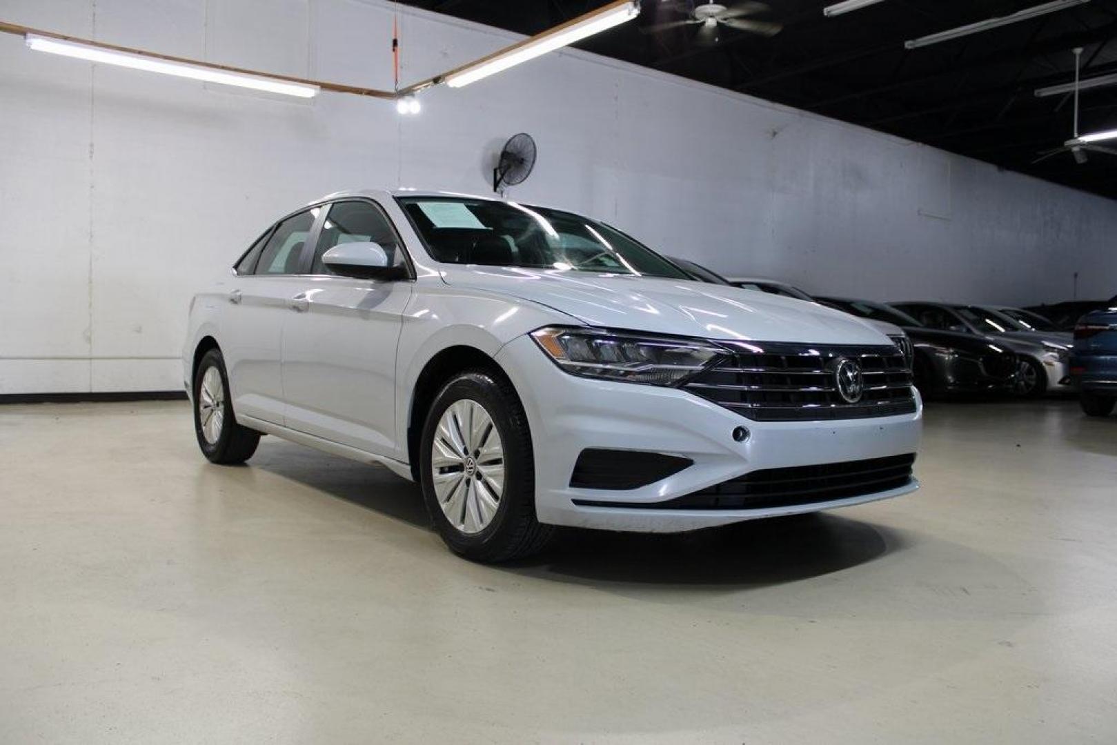 2019 Platinum Gray Metallic Volkswagen Jetta (3VWC57BU6KM) with an 1.4L TSI engine, Automatic transmission, located at 15300 Midway Rd., Addison, TX, 75001, (972) 702-0011, 32.958321, -96.838074 - Photo#1