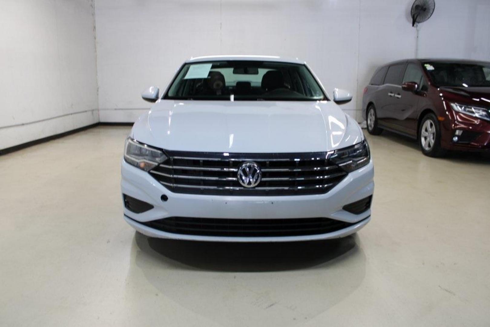 2019 Platinum Gray Metallic Volkswagen Jetta (3VWC57BU6KM) with an 1.4L TSI engine, Automatic transmission, located at 15300 Midway Rd., Addison, TX, 75001, (972) 702-0011, 32.958321, -96.838074 - Photo#5