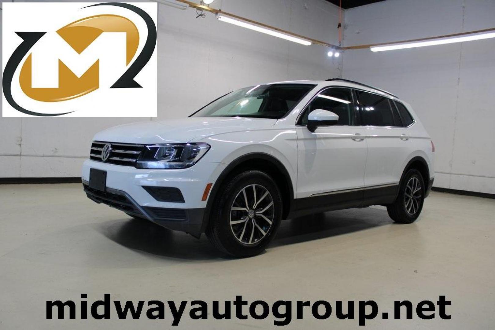 2018 White Volkswagen Tiguan 2.0T SE (3VV3B7AX0JM) with an 2.0L TSI DOHC engine, Automatic transmission, located at 15300 Midway Rd., Addison, TX, 75001, (972) 702-0011, 32.958321, -96.838074 - Photo#0