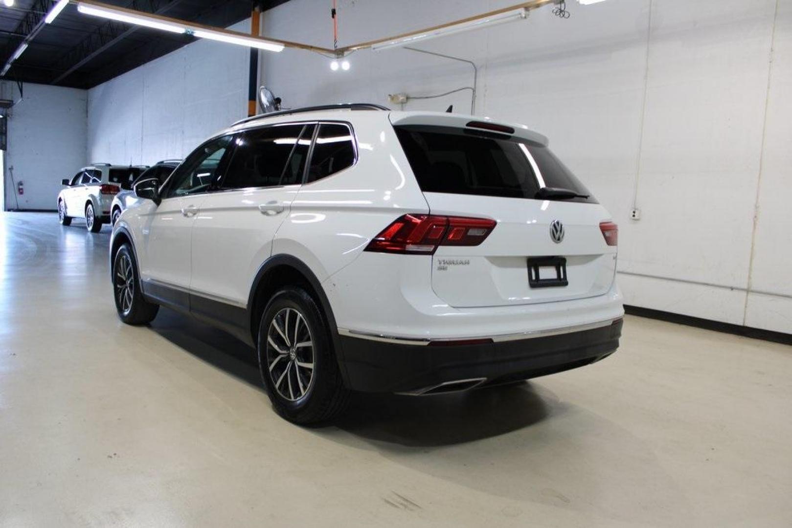 2018 White Volkswagen Tiguan 2.0T SE (3VV3B7AX0JM) with an 2.0L TSI DOHC engine, Automatic transmission, located at 15300 Midway Rd., Addison, TX, 75001, (972) 702-0011, 32.958321, -96.838074 - Photo#3