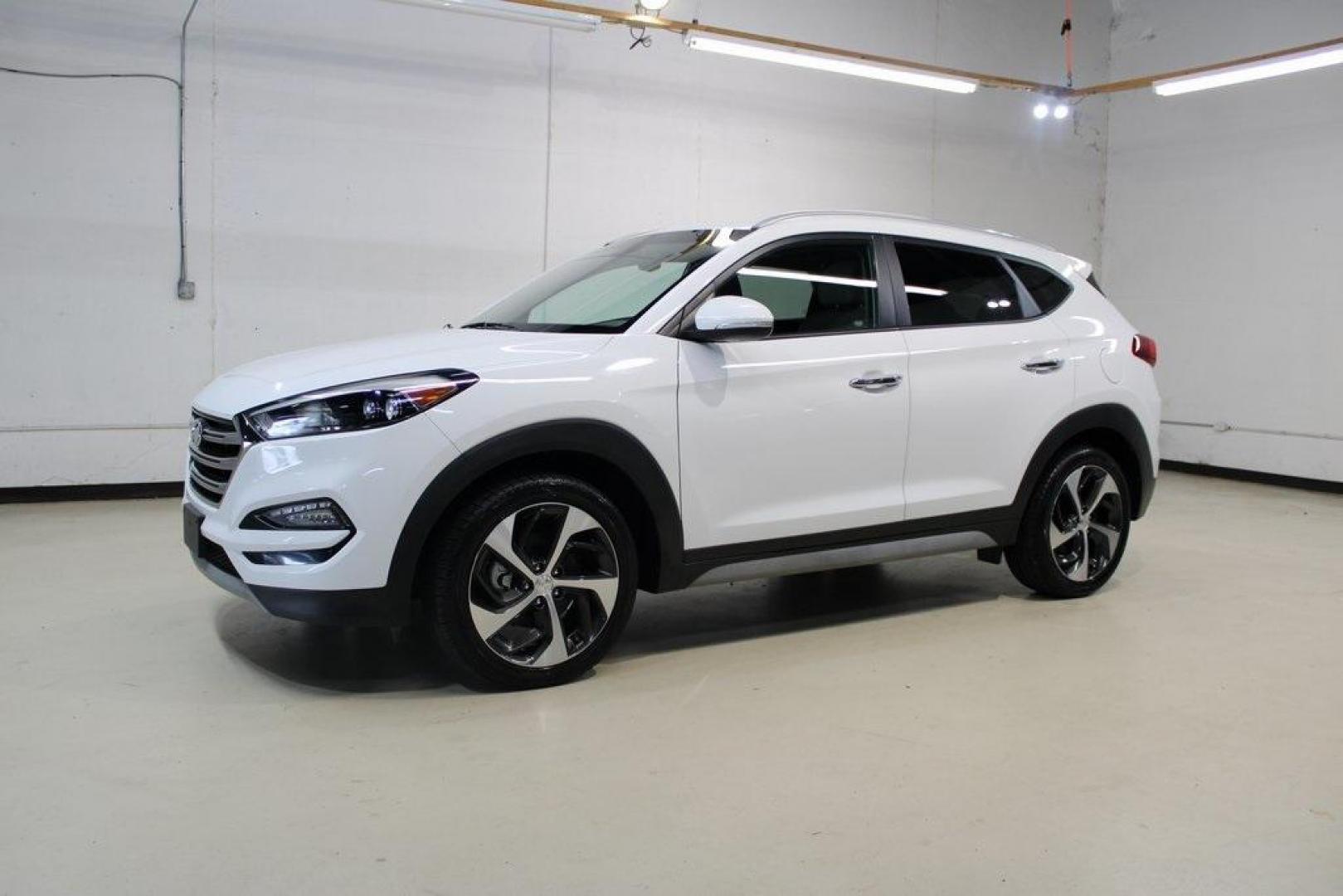 2018 Dazzling White /Beige Hyundai Tucson Limited (KM8J33A28JU) with an 1.6L I4 DGI Turbocharged DOHC 16V ULEV II 175hp engine, Automatic transmission, located at 15300 Midway Rd., Addison, TX, 75001, (972) 702-0011, 32.958321, -96.838074 - Photo#4