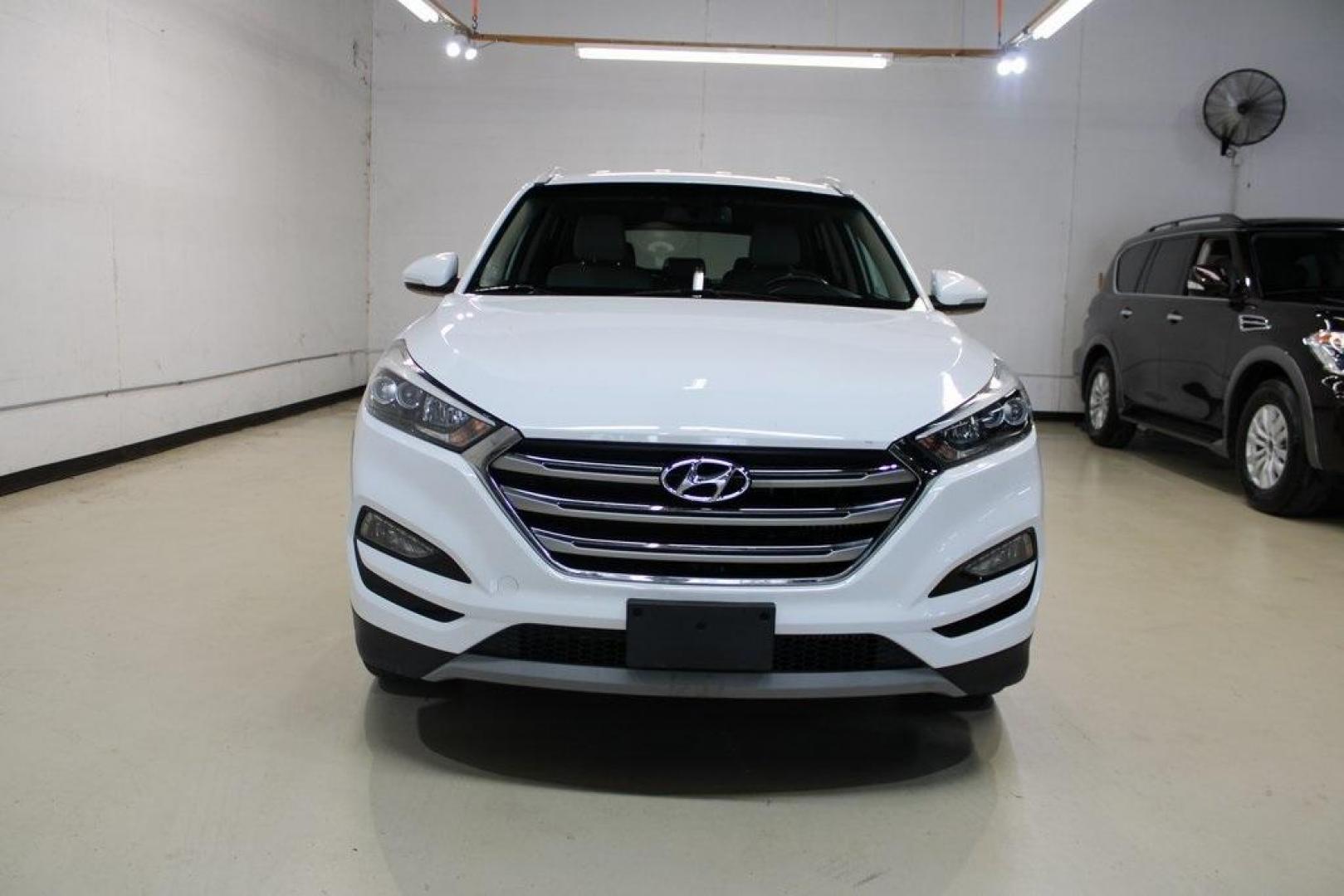 2018 Dazzling White /Beige Hyundai Tucson Limited (KM8J33A28JU) with an 1.6L I4 DGI Turbocharged DOHC 16V ULEV II 175hp engine, Automatic transmission, located at 15300 Midway Rd., Addison, TX, 75001, (972) 702-0011, 32.958321, -96.838074 - Photo#5