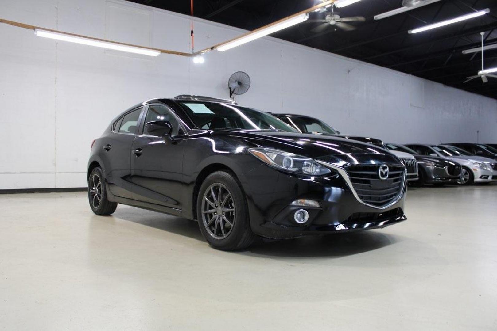 2015 Jet Black Mica /Black Mazda Mazda3 i Grand Touring (JM1BM1M77F1) with an 2.0L I4 engine, Automatic transmission, located at 15300 Midway Rd., Addison, TX, 75001, (972) 702-0011, 32.958321, -96.838074 - Photo#1