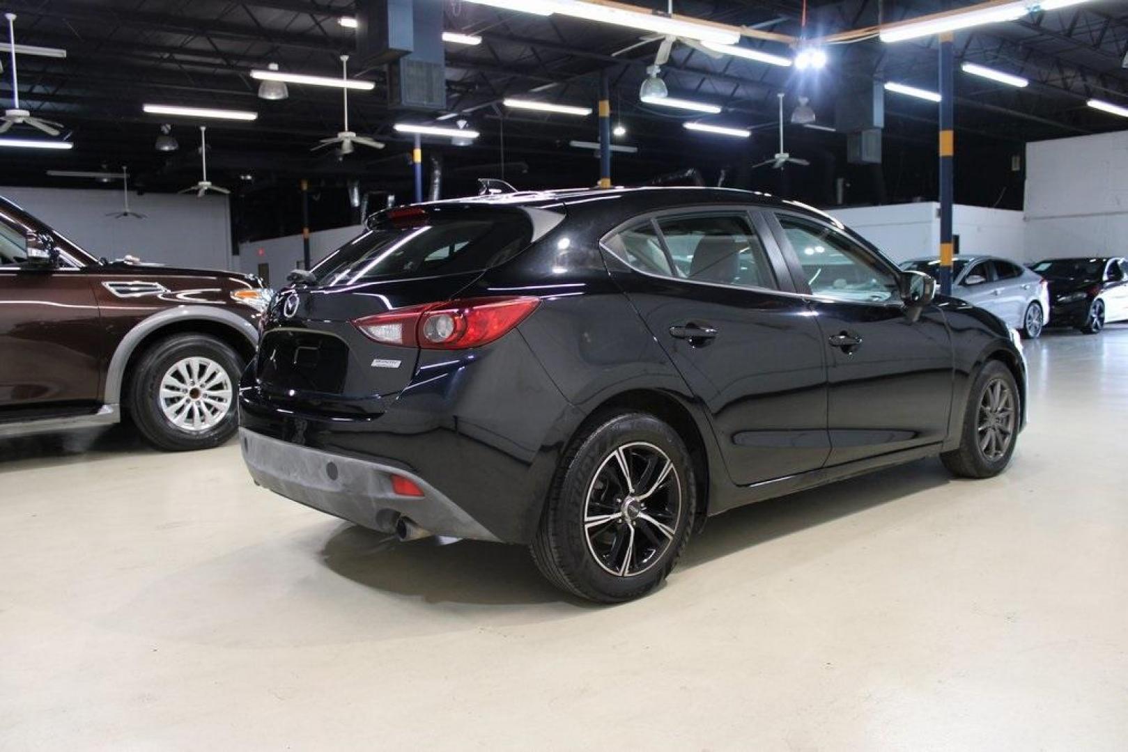 2015 Jet Black Mica /Black Mazda Mazda3 i Grand Touring (JM1BM1M77F1) with an 2.0L I4 engine, Automatic transmission, located at 15300 Midway Rd., Addison, TX, 75001, (972) 702-0011, 32.958321, -96.838074 - Photo#2