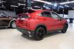 2018 Red Mitsubishi Eclipse Cross LE (JA4AT4AA0JZ) with an 1.5L I4 Turbocharged DOHC 16V LEV3-ULEV70 152hp engine, CVT transmission, located at 15300 Midway Rd., Addison, TX, 75001, (972) 702-0011, 32.958321, -96.838074 - Photo#2