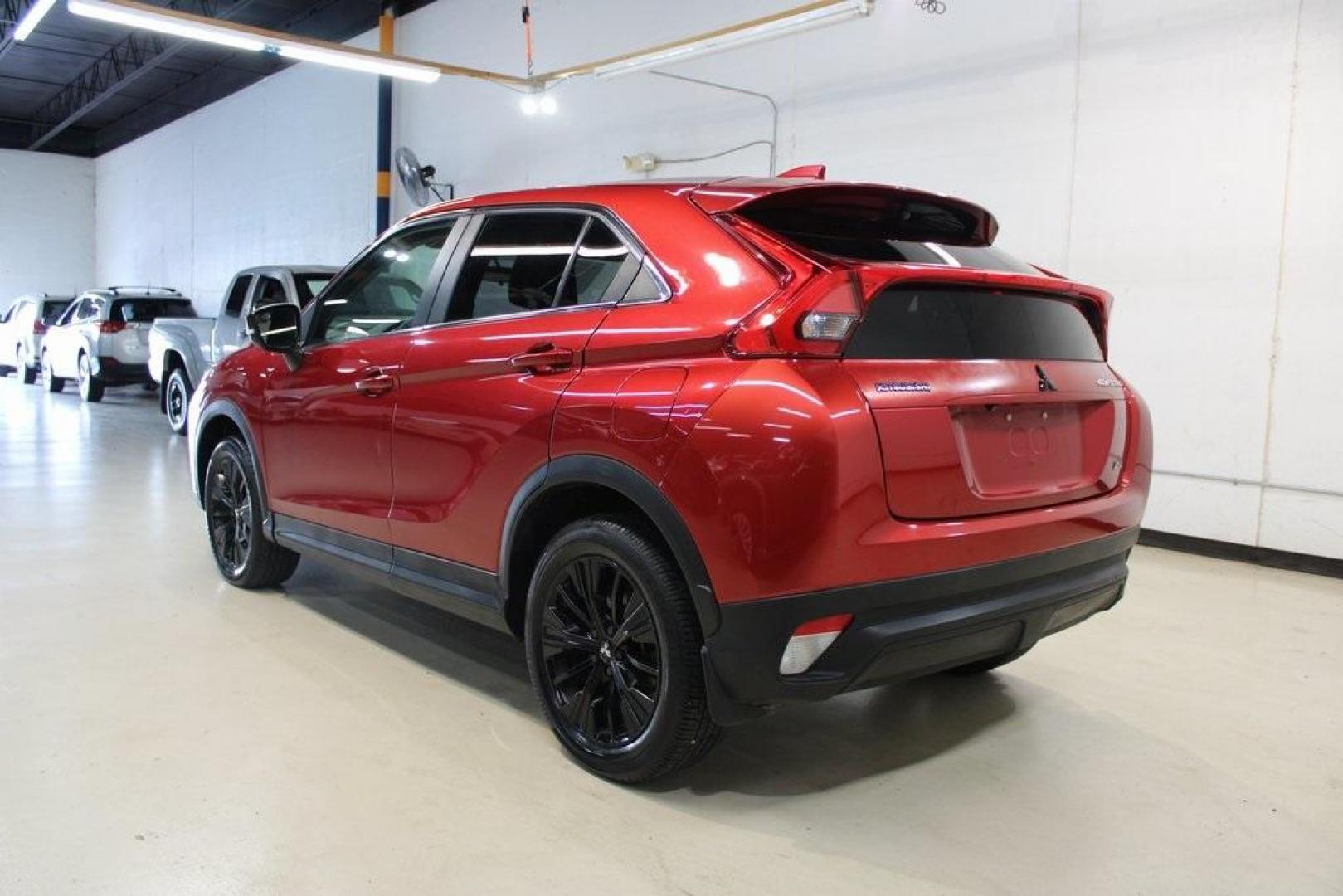 2018 Red Mitsubishi Eclipse Cross LE (JA4AT4AA0JZ) with an 1.5L I4 Turbocharged DOHC 16V LEV3-ULEV70 152hp engine, CVT transmission, located at 15300 Midway Rd., Addison, TX, 75001, (972) 702-0011, 32.958321, -96.838074 - Photo#3