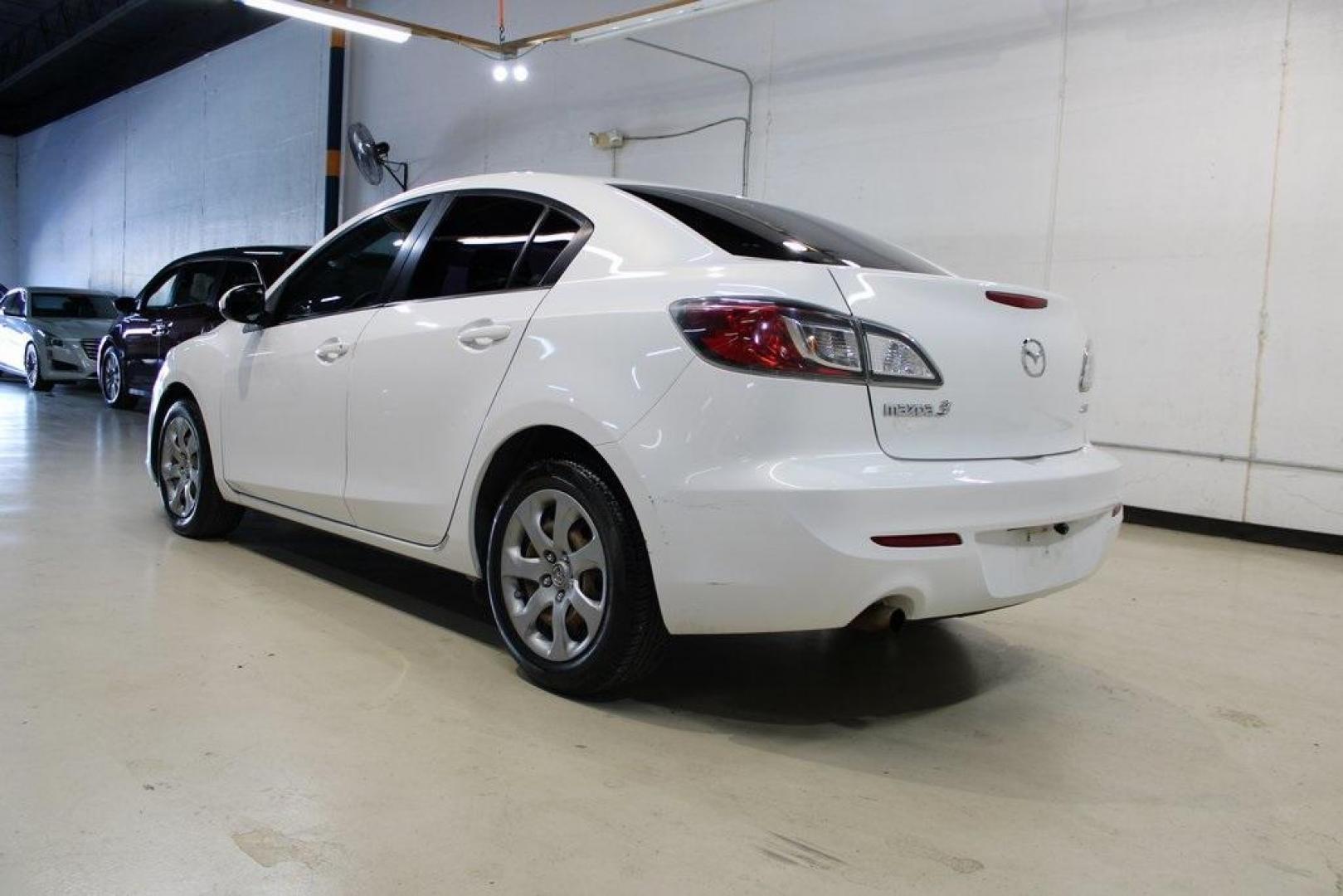 2013 Crystal White Pearl Mica /Black Mazda Mazda3 i Sport (JM1BL1U78D1) with an 2.0L 4-Cylinder engine, Automatic transmission, located at 15300 Midway Rd., Addison, TX, 75001, (972) 702-0011, 32.958321, -96.838074 - Photo#3