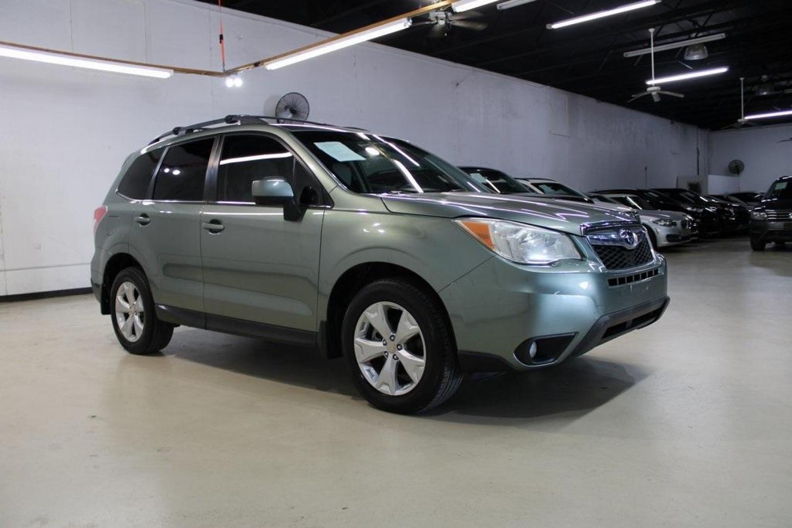 2014 Jasmine Green Metallic /Gray Subaru Forester 2.5i Limited (JF2SJAHC4EH) with an 2.5L 4-Cylinder DOHC 16V VVT engine, CVT transmission, located at 15300 Midway Rd., Addison, TX, 75001, (972) 702-0011, 32.958321, -96.838074 - HOME OF THE NO HAGGLE PRICE - WHOLESALE PRICES TO THE PUBLIC!! Forester 2.5i Limited, 4D Sport Utility, 2.5L 4-Cylinder DOHC 16V VVT, Lineartronic CVT, AWD, Jasmine Green Metallic, Gray Leather.<br><br>Jasmine Green Metallic 2014 Subaru Forester 2.5i Limited<br><br>24/32 City/Highway MPG<br><br>Awar - Photo#5