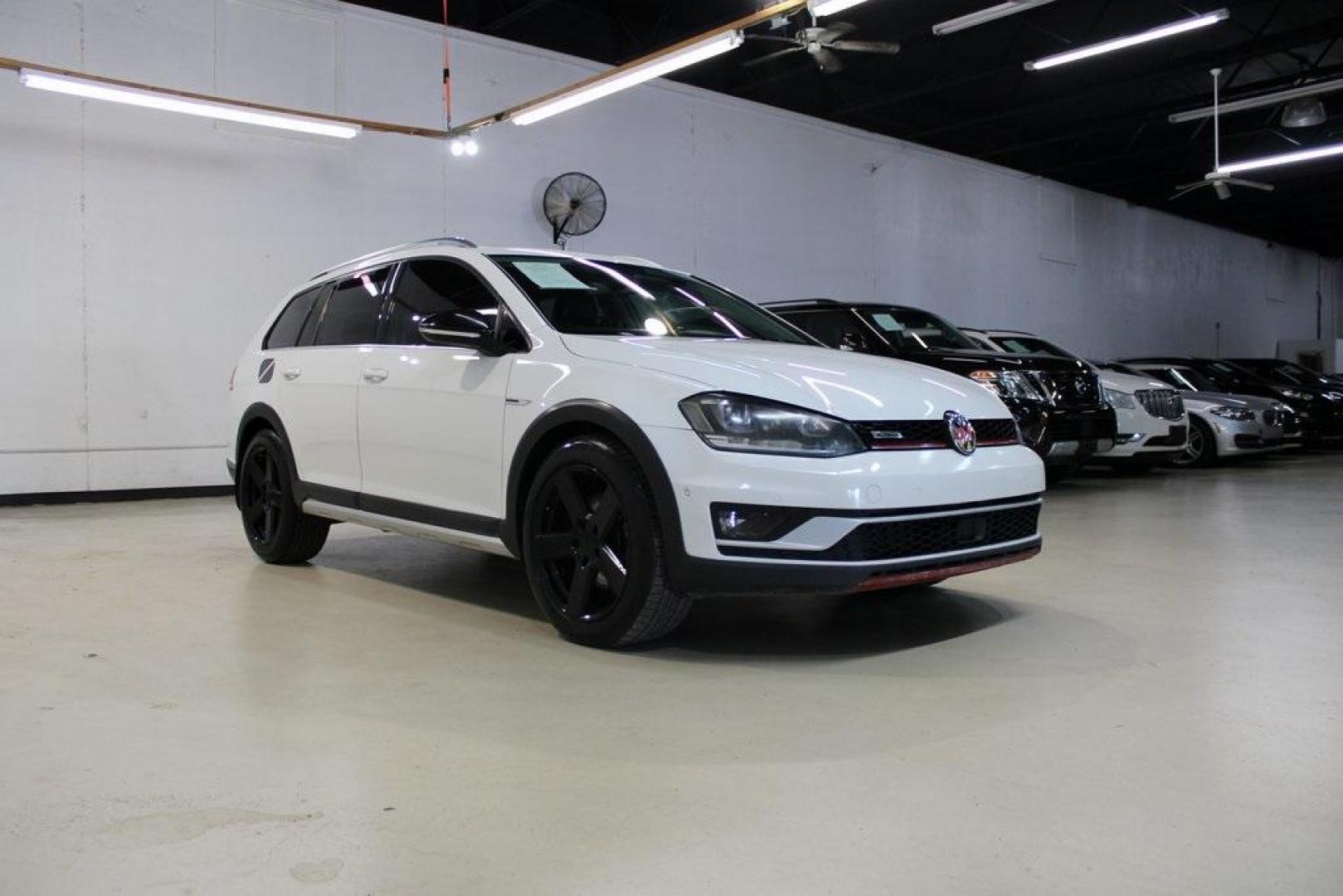 2017 Pure White Volkswagen Golf Alltrack (3VWH17AU0HM) with an 1.8L I4 Turbocharged DOHC 16V SULEV II 170hp engine, Automatic transmission, located at 15300 Midway Rd., Addison, TX, 75001, (972) 702-0011, 32.958321, -96.838074 - HOME OF THE NO HAGGLE PRICE - WHOLESALE PRICES TO THE PUBLIC!! 4D Wagon, 1.8L I4 Turbocharged DOHC 16V SULEV II 170hp, 6-Speed DSG Automatic with Tiptronic, AWD, White.<br><br>White 2017 Volkswagen Golf Alltrack<br><br>Recent Arrival! 22/30 City/Highway MPG<br><br><br>At Midway Auto Group, we strive - Photo#1