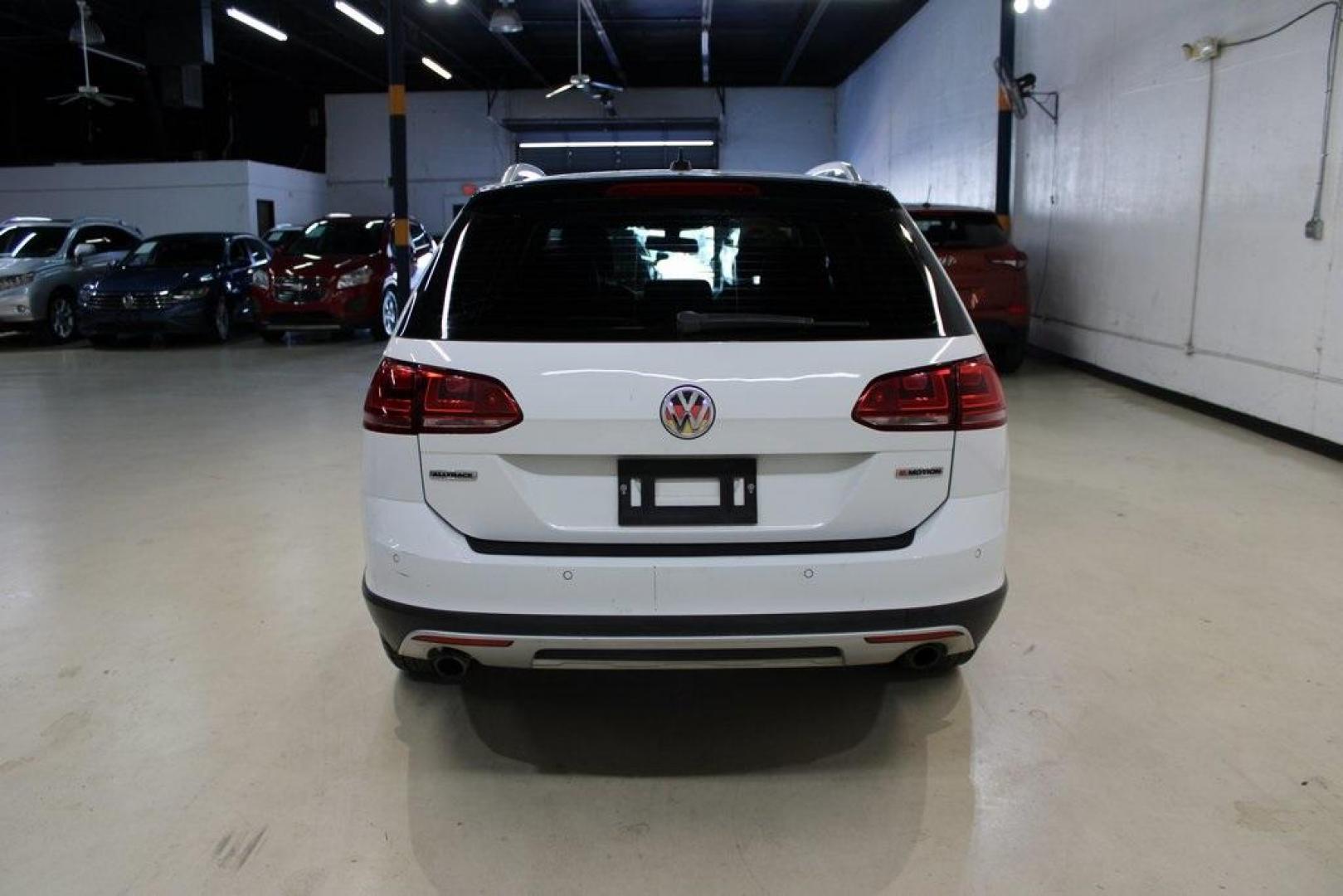 2017 Pure White Volkswagen Golf Alltrack (3VWH17AU0HM) with an 1.8L I4 Turbocharged DOHC 16V SULEV II 170hp engine, Automatic transmission, located at 15300 Midway Rd., Addison, TX, 75001, (972) 702-0011, 32.958321, -96.838074 - HOME OF THE NO HAGGLE PRICE - WHOLESALE PRICES TO THE PUBLIC!! 4D Wagon, 1.8L I4 Turbocharged DOHC 16V SULEV II 170hp, 6-Speed DSG Automatic with Tiptronic, AWD, White.<br><br>White 2017 Volkswagen Golf Alltrack<br><br>Recent Arrival! 22/30 City/Highway MPG<br><br><br>At Midway Auto Group, we strive - Photo#7