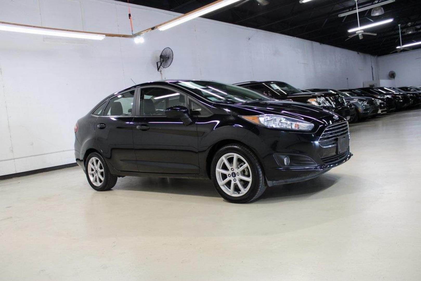 2019 Shadow Black /Charcoal Black Ford Fiesta SE (3FADP4BJ9KM) with an 1.6L I4 Ti-VCT engine, Automatic transmission, located at 15300 Midway Rd., Addison, TX, 75001, (972) 702-0011, 32.958321, -96.838074 - Photo#6