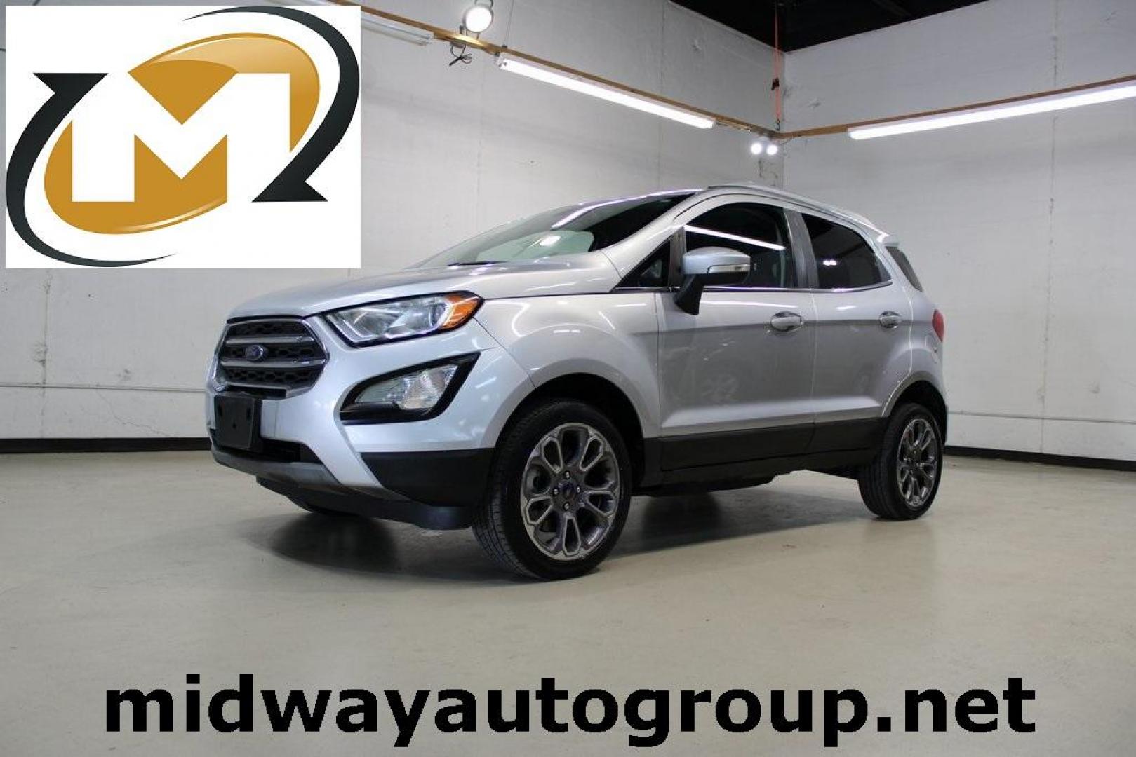 2020 Moondust Silver Metallic /Ebony Black Ford EcoSport Titanium (MAJ6S3KLXLC) with an 2.0L I4 Ti-VCT GDI engine, Automatic transmission, located at 15300 Midway Rd., Addison, TX, 75001, (972) 702-0011, 32.958321, -96.838074 - HOME OF THE NO HAGGLE PRICE - WHOLESALE PRICES TO THE PUBLIC!! EcoSport Titanium, 4D Sport Utility, 2.0L I4 Ti-VCT GDI, 6-Speed Automatic, 4WD, Silver, Ebony Black Leather.<br><br>Silver 2020 Ford EcoSport Titanium<br><br>23/29 City/Highway MPG<br><br><br>At Midway Auto Group, we strive to provide y - Photo#0