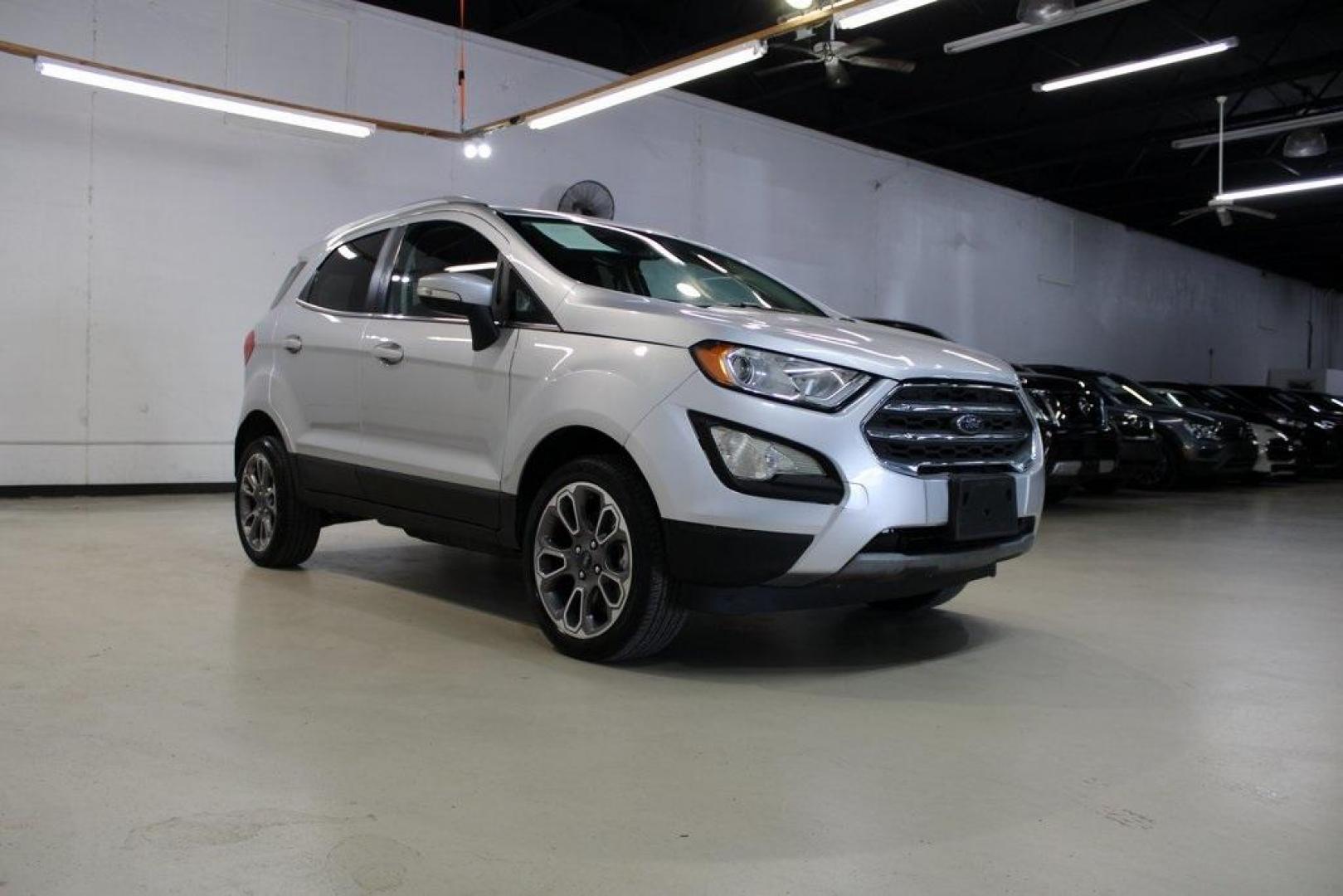 2020 Moondust Silver Metallic /Ebony Black Ford EcoSport Titanium (MAJ6S3KLXLC) with an 2.0L I4 Ti-VCT GDI engine, Automatic transmission, located at 15300 Midway Rd., Addison, TX, 75001, (972) 702-0011, 32.958321, -96.838074 - HOME OF THE NO HAGGLE PRICE - WHOLESALE PRICES TO THE PUBLIC!! EcoSport Titanium, 4D Sport Utility, 2.0L I4 Ti-VCT GDI, 6-Speed Automatic, 4WD, Silver, Ebony Black Leather.<br><br>Silver 2020 Ford EcoSport Titanium<br><br>23/29 City/Highway MPG<br><br><br>At Midway Auto Group, we strive to provide y - Photo#1