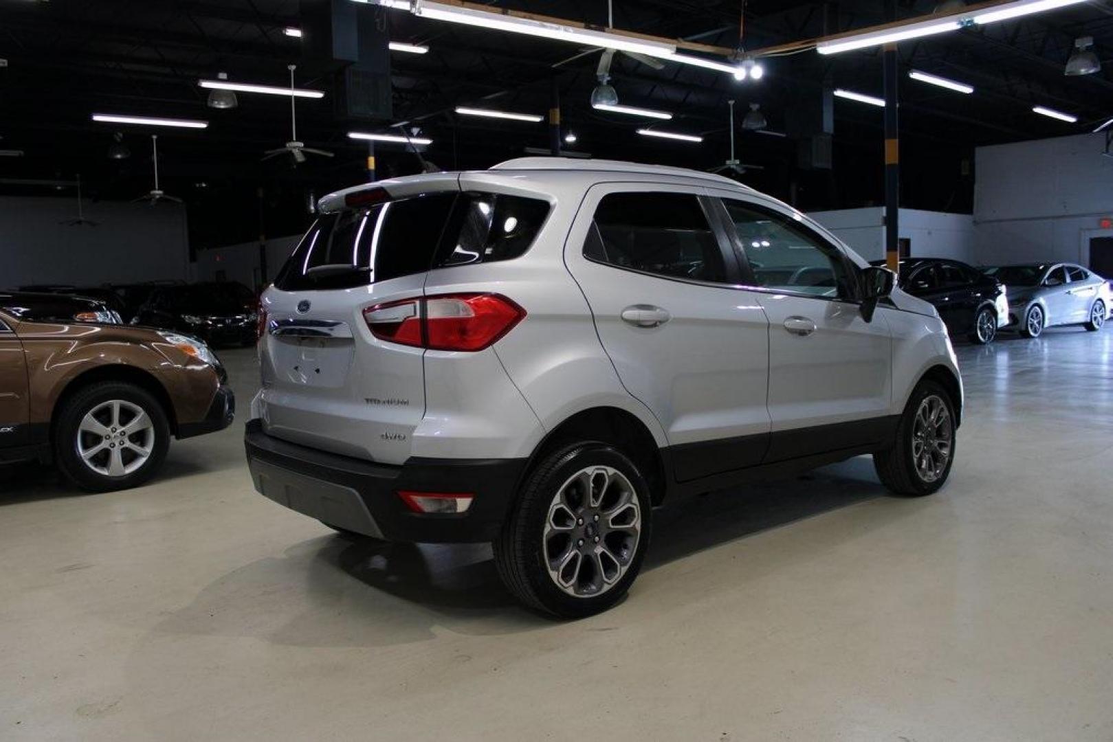 2020 Moondust Silver Metallic /Ebony Black Ford EcoSport Titanium (MAJ6S3KLXLC) with an 2.0L I4 Ti-VCT GDI engine, Automatic transmission, located at 15300 Midway Rd., Addison, TX, 75001, (972) 702-0011, 32.958321, -96.838074 - HOME OF THE NO HAGGLE PRICE - WHOLESALE PRICES TO THE PUBLIC!! EcoSport Titanium, 4D Sport Utility, 2.0L I4 Ti-VCT GDI, 6-Speed Automatic, 4WD, Silver, Ebony Black Leather.<br><br>Silver 2020 Ford EcoSport Titanium<br><br>23/29 City/Highway MPG<br><br><br>At Midway Auto Group, we strive to provide y - Photo#2