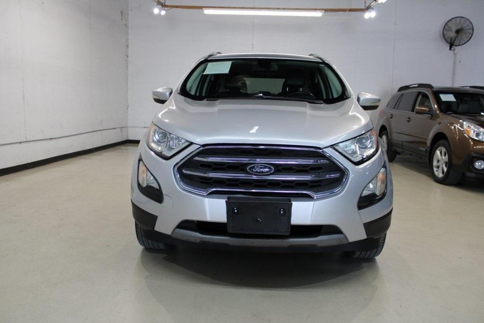 2020 Moondust Silver Metallic /Ebony Black Ford EcoSport Titanium (MAJ6S3KLXLC) with an 2.0L I4 Ti-VCT GDI engine, Automatic transmission, located at 15300 Midway Rd., Addison, TX, 75001, (972) 702-0011, 32.958321, -96.838074 - HOME OF THE NO HAGGLE PRICE - WHOLESALE PRICES TO THE PUBLIC!! EcoSport Titanium, 4D Sport Utility, 2.0L I4 Ti-VCT GDI, 6-Speed Automatic, 4WD, Silver, Ebony Black Leather.<br><br>Silver 2020 Ford EcoSport Titanium<br><br>23/29 City/Highway MPG<br><br><br>At Midway Auto Group, we strive to provide y - Photo#5