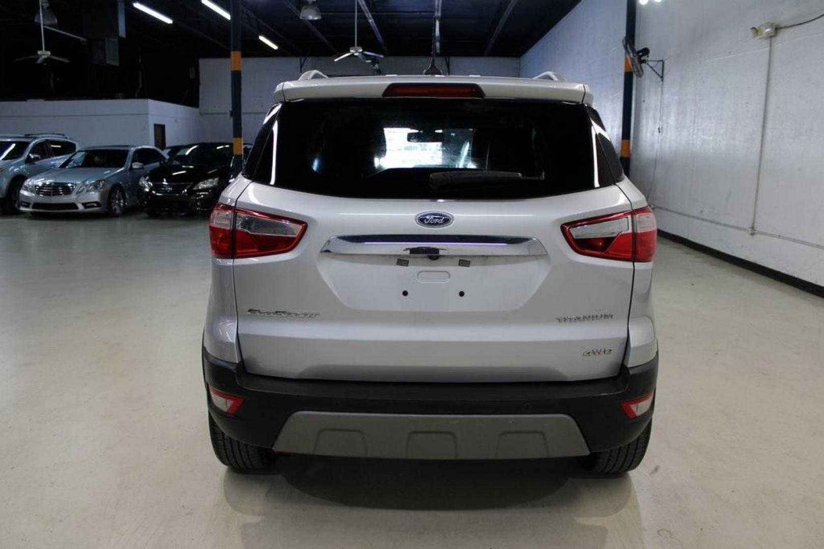 2020 Moondust Silver Metallic /Ebony Black Ford EcoSport Titanium (MAJ6S3KLXLC) with an 2.0L I4 Ti-VCT GDI engine, Automatic transmission, located at 15300 Midway Rd., Addison, TX, 75001, (972) 702-0011, 32.958321, -96.838074 - HOME OF THE NO HAGGLE PRICE - WHOLESALE PRICES TO THE PUBLIC!! EcoSport Titanium, 4D Sport Utility, 2.0L I4 Ti-VCT GDI, 6-Speed Automatic, 4WD, Silver, Ebony Black Leather.<br><br>Silver 2020 Ford EcoSport Titanium<br><br>23/29 City/Highway MPG<br><br><br>At Midway Auto Group, we strive to provide y - Photo#7