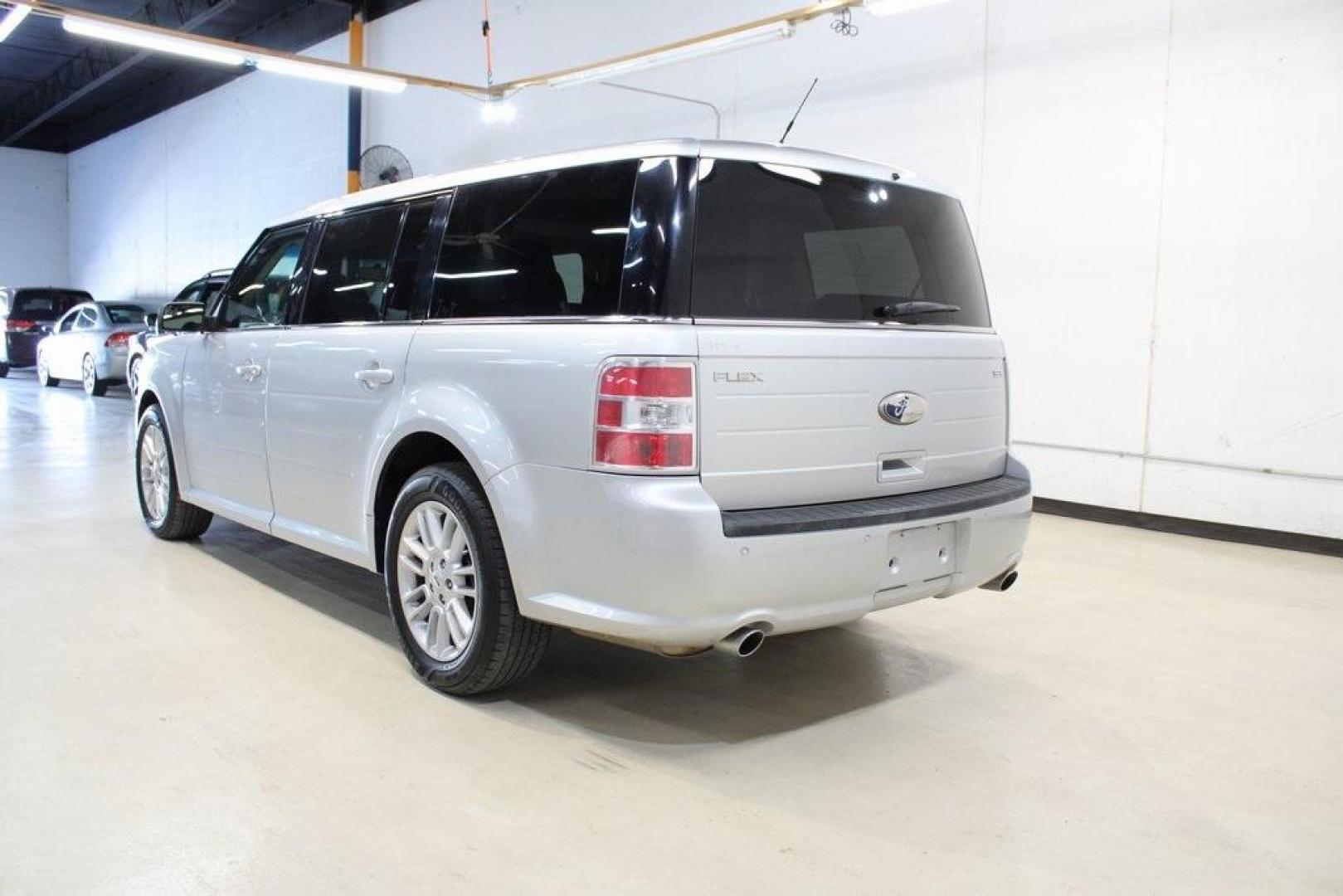 2013 Ingot Silver Metallic /Charcoal Black Ford Flex SEL (2FMGK5C83DB) with an 3.5L V6 Ti-VCT engine, Automatic transmission, located at 15300 Midway Rd., Addison, TX, 75001, (972) 702-0011, 32.958321, -96.838074 - HOME OF THE NO HAGGLE PRICE - WHOLESALE PRICES TO THE PUBLIC!! Flex SEL, 4D Sport Utility, 3.5L V6 Ti-VCT, 6-Speed Automatic with Select-Shift, FWD, Silver, Charcoal Black Cloth.<br><br>Silver 2013 Ford Flex SEL<br><br><br>Awards:<br> * 2013 IIHS Top Safety Pick * 2013 KBB.com Brand Image Awards< - Photo#3