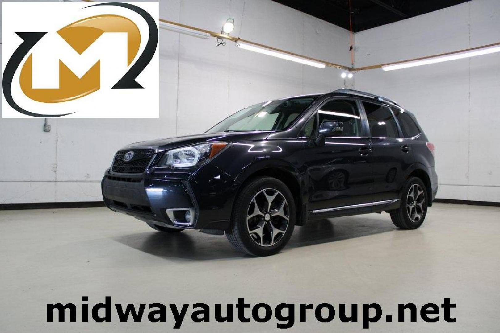 2016 Dark Gray Metallic /Black Subaru Forester 2.0XT Touring (JF2SJGXC6GH) with an 2.0L 4-Cylinder DOHC 16V Turbocharged Intercooled engine, CVT transmission, located at 15300 Midway Rd., Addison, TX, 75001, (972) 702-0011, 32.958321, -96.838074 - Photo#0