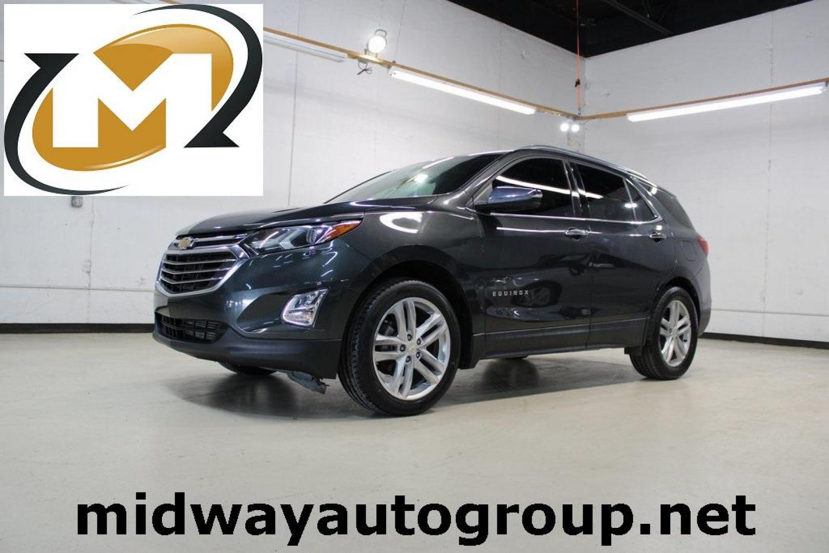 2018 Nightfall Gray Metallic /Jet Black/Brandy Chevrolet Equinox Premier (2GNAXMEV0J6) with an 1.5L DOHC engine, Automatic transmission, located at 15300 Midway Rd., Addison, TX, 75001, (972) 702-0011, 32.958321, -96.838074 - HOME OF THE NO HAGGLE PRICE - WHOLESALE PRICES TO THE PUBLIC!! Equinox Premier, 4D Sport Utility, 1.5L DOHC, 6-Speed Automatic Electronic with Overdrive, FWD, Nightfall Gray Metallic, Jet Black/Brandy Leather.<br><br>Nightfall Gray Metallic 2018 Chevrolet Equinox Premier<br><br>26/32 City/Highway MP - Photo#0