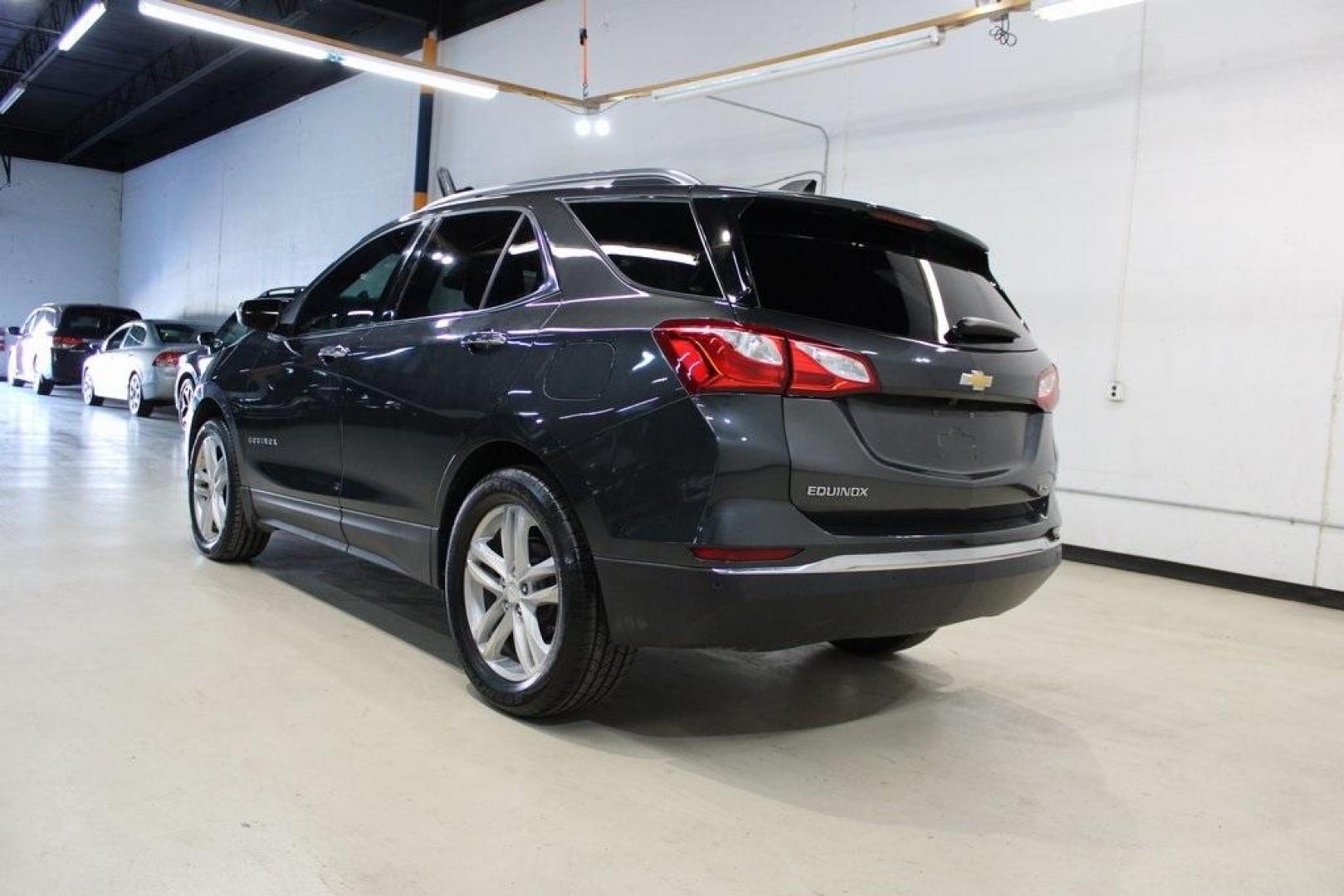 2018 Nightfall Gray Metallic /Jet Black/Brandy Chevrolet Equinox Premier (2GNAXMEV0J6) with an 1.5L DOHC engine, Automatic transmission, located at 15300 Midway Rd., Addison, TX, 75001, (972) 702-0011, 32.958321, -96.838074 - HOME OF THE NO HAGGLE PRICE - WHOLESALE PRICES TO THE PUBLIC!! Equinox Premier, 4D Sport Utility, 1.5L DOHC, 6-Speed Automatic Electronic with Overdrive, FWD, Nightfall Gray Metallic, Jet Black/Brandy Leather.<br><br>Nightfall Gray Metallic 2018 Chevrolet Equinox Premier<br><br>26/32 City/Highway MP - Photo#3