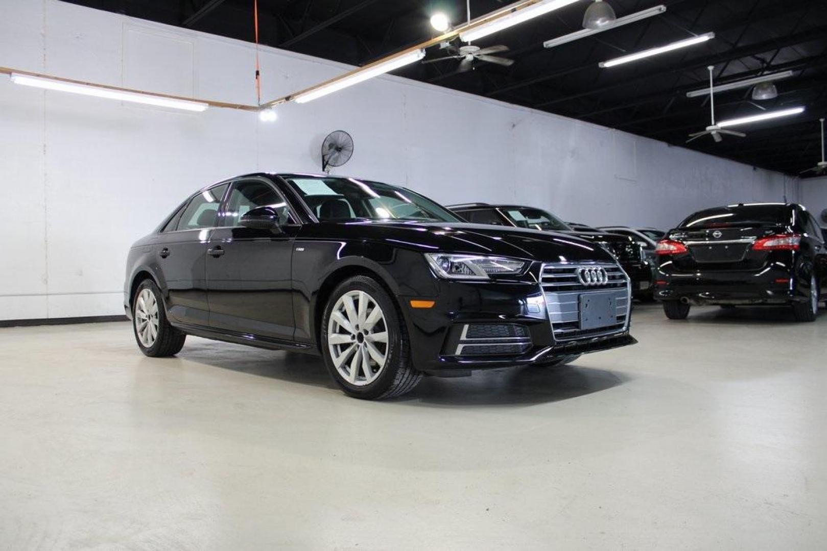 2018 Black Audi A4 (WAUKMAF40JN) with an 2.0L I4 TFSI DOHC engine, Automatic transmission, located at 15300 Midway Rd., Addison, TX, 75001, (972) 702-0011, 32.958321, -96.838074 - Photo#1