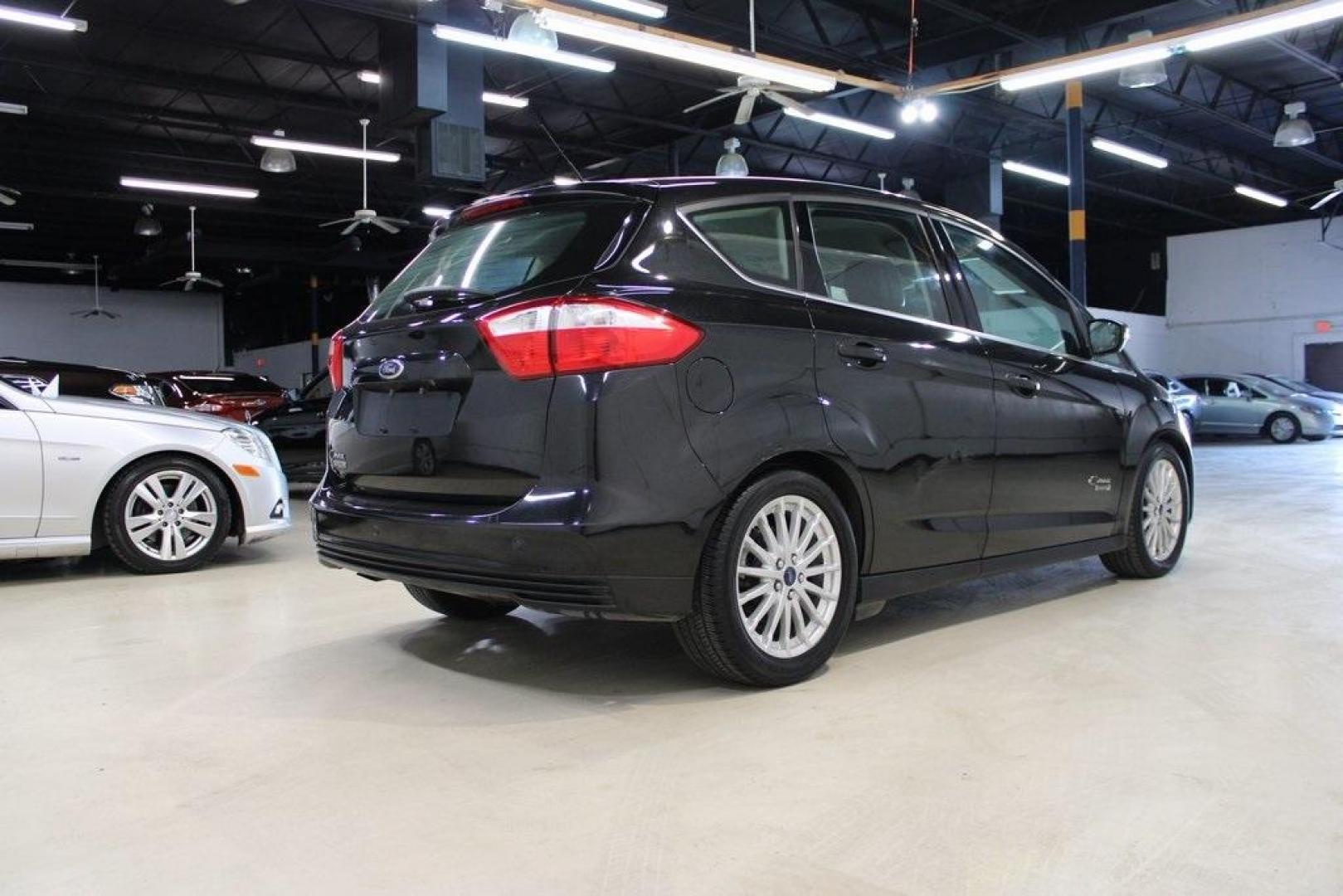 2015 Tuxedo Black Ford C-Max Energi SEL (1FADP5CU7FL) with an I4 Hybrid engine, CVT transmission, located at 15300 Midway Rd., Addison, TX, 75001, (972) 702-0011, 32.958321, -96.838074 - Photo#2