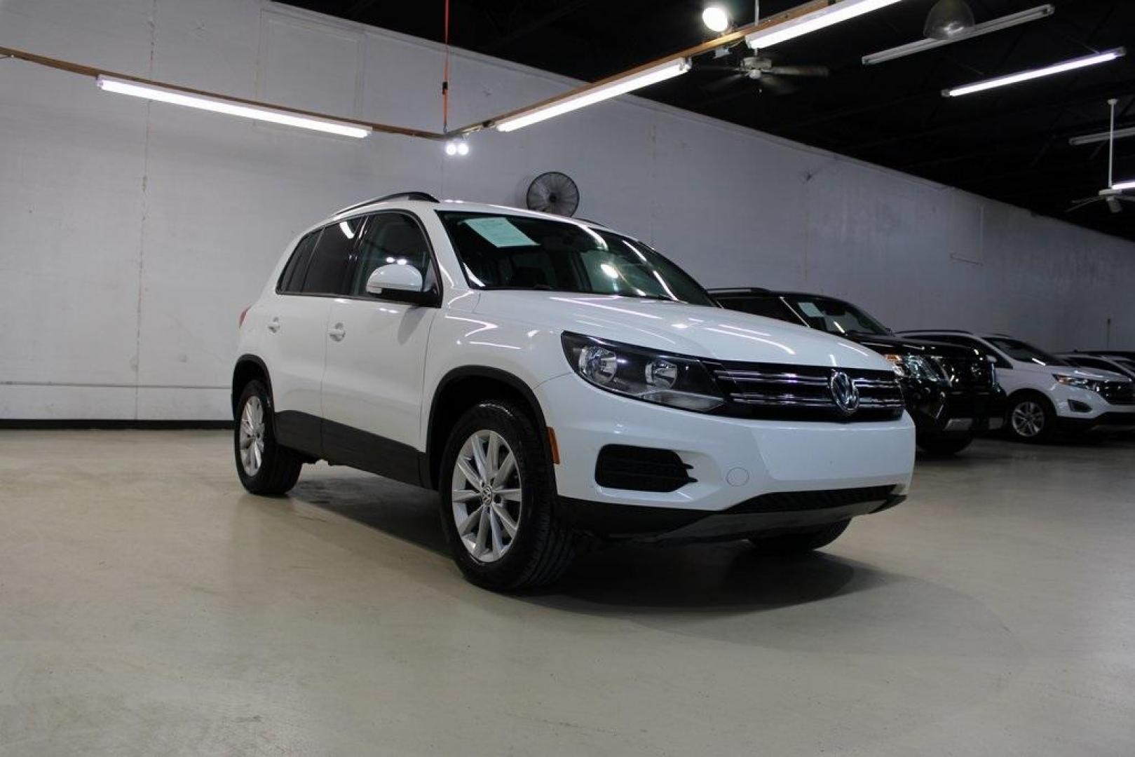 2017 Pure White Volkswagen Tiguan 2.0T S (WVGAV7AX1HK) with an 2.0L TSI DOHC engine, Automatic transmission, located at 15300 Midway Rd., Addison, TX, 75001, (972) 702-0011, 32.958321, -96.838074 - Photo#1