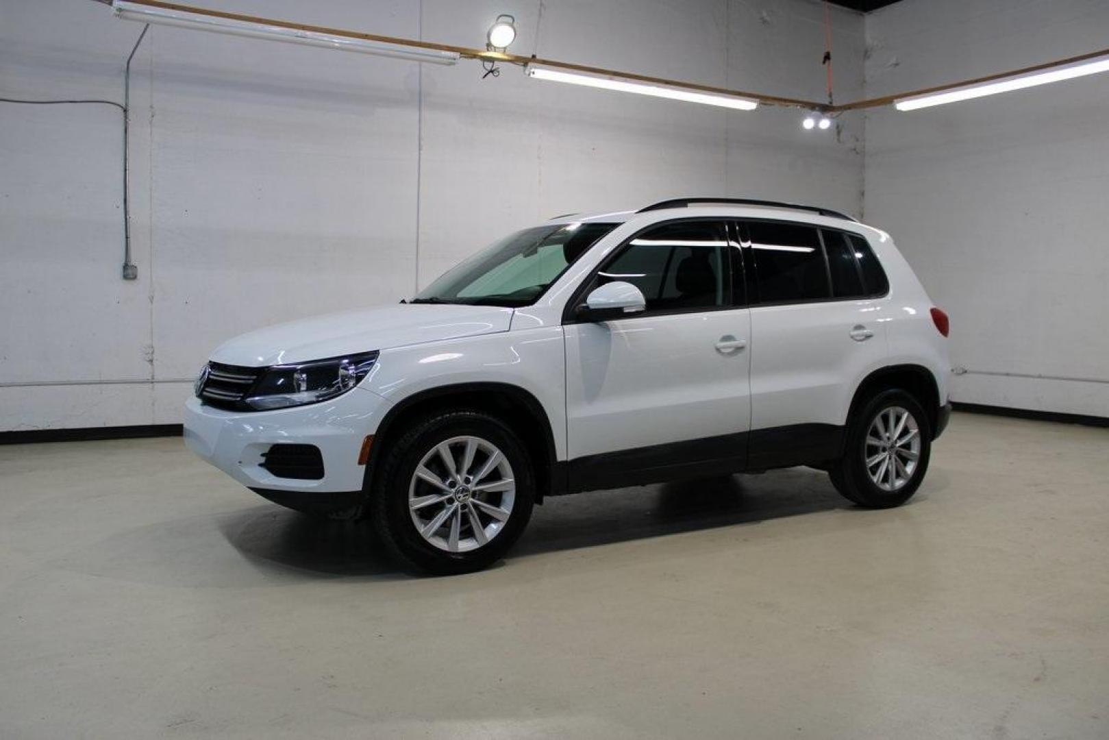 2017 Pure White Volkswagen Tiguan 2.0T S (WVGAV7AX1HK) with an 2.0L TSI DOHC engine, Automatic transmission, located at 15300 Midway Rd., Addison, TX, 75001, (972) 702-0011, 32.958321, -96.838074 - Photo#4