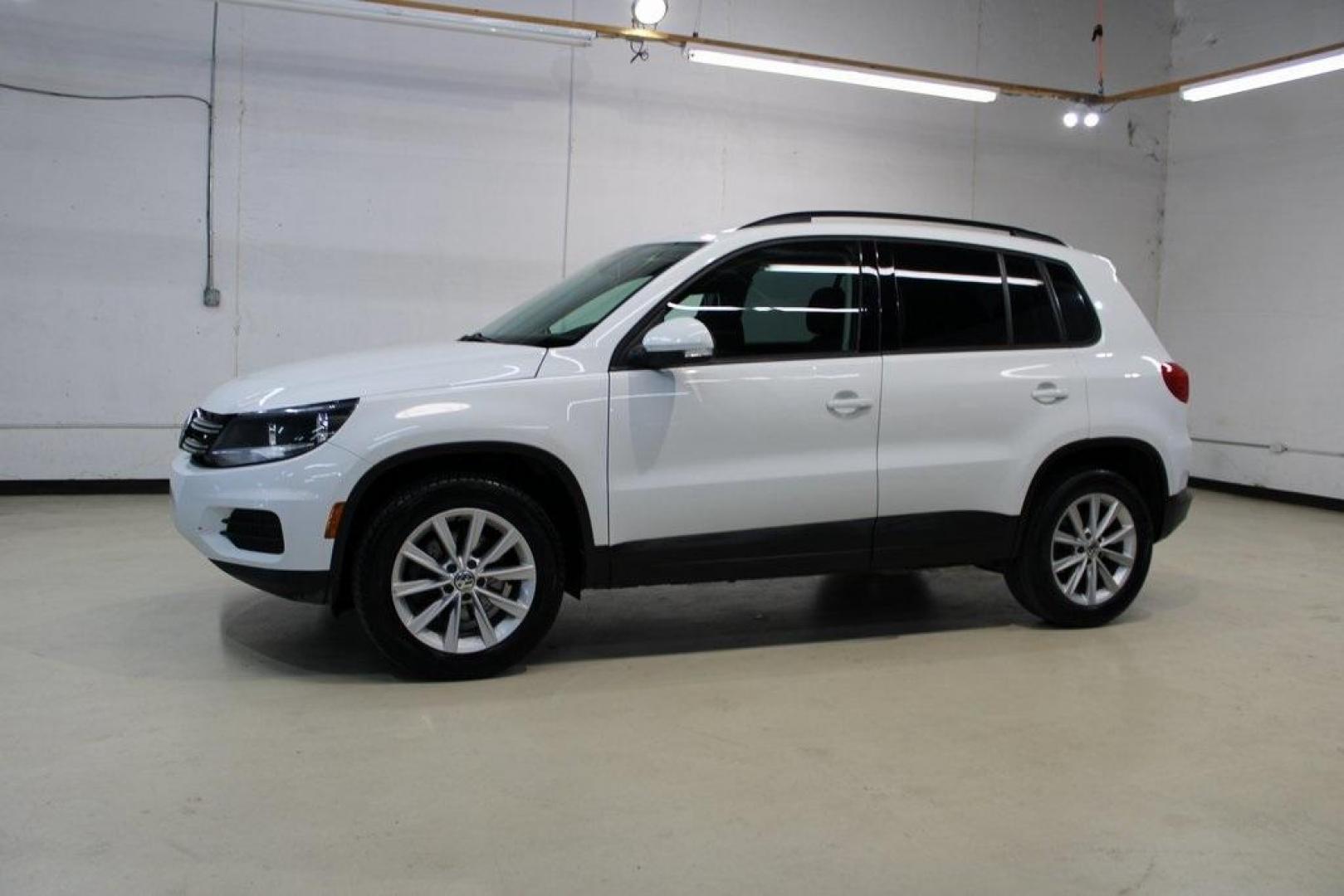 2017 Pure White Volkswagen Tiguan 2.0T S (WVGAV7AX1HK) with an 2.0L TSI DOHC engine, Automatic transmission, located at 15300 Midway Rd., Addison, TX, 75001, (972) 702-0011, 32.958321, -96.838074 - Photo#8