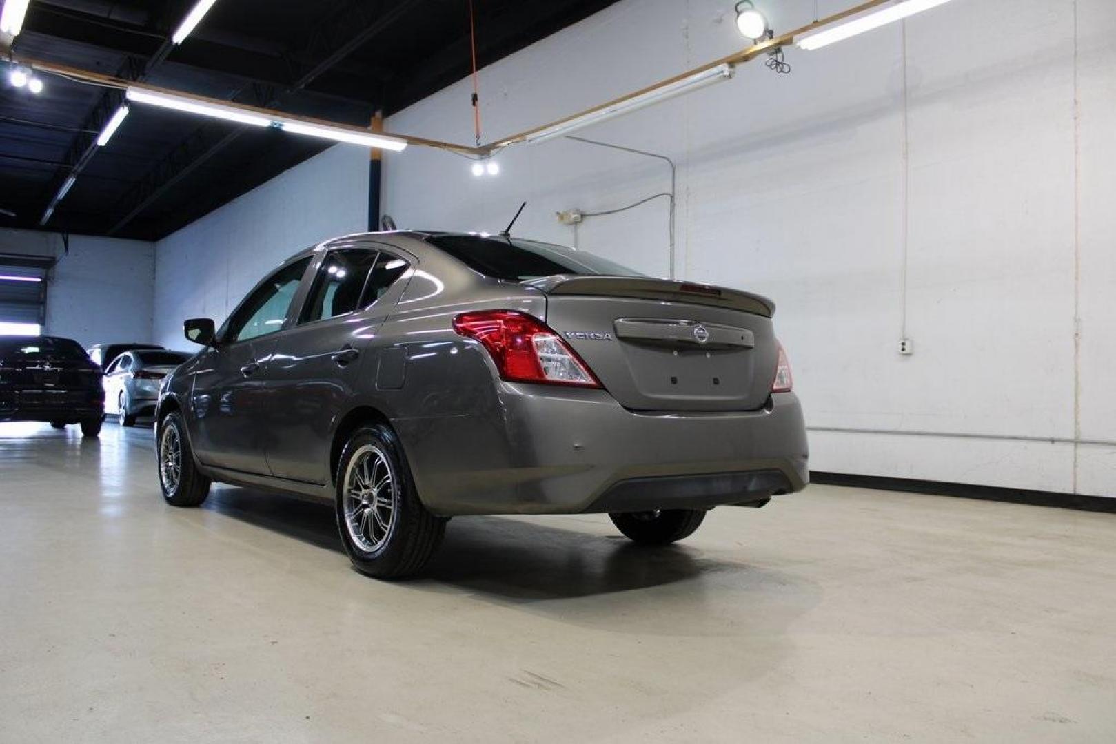 2017 Titanium /Charcoal Nissan Versa 1.6 S Plus (3N1CN7AP9HL) with an 1.6L I4 DOHC 16V engine, CVT transmission, located at 15300 Midway Rd., Addison, TX, 75001, (972) 702-0011, 32.958321, -96.838074 - Photo#4