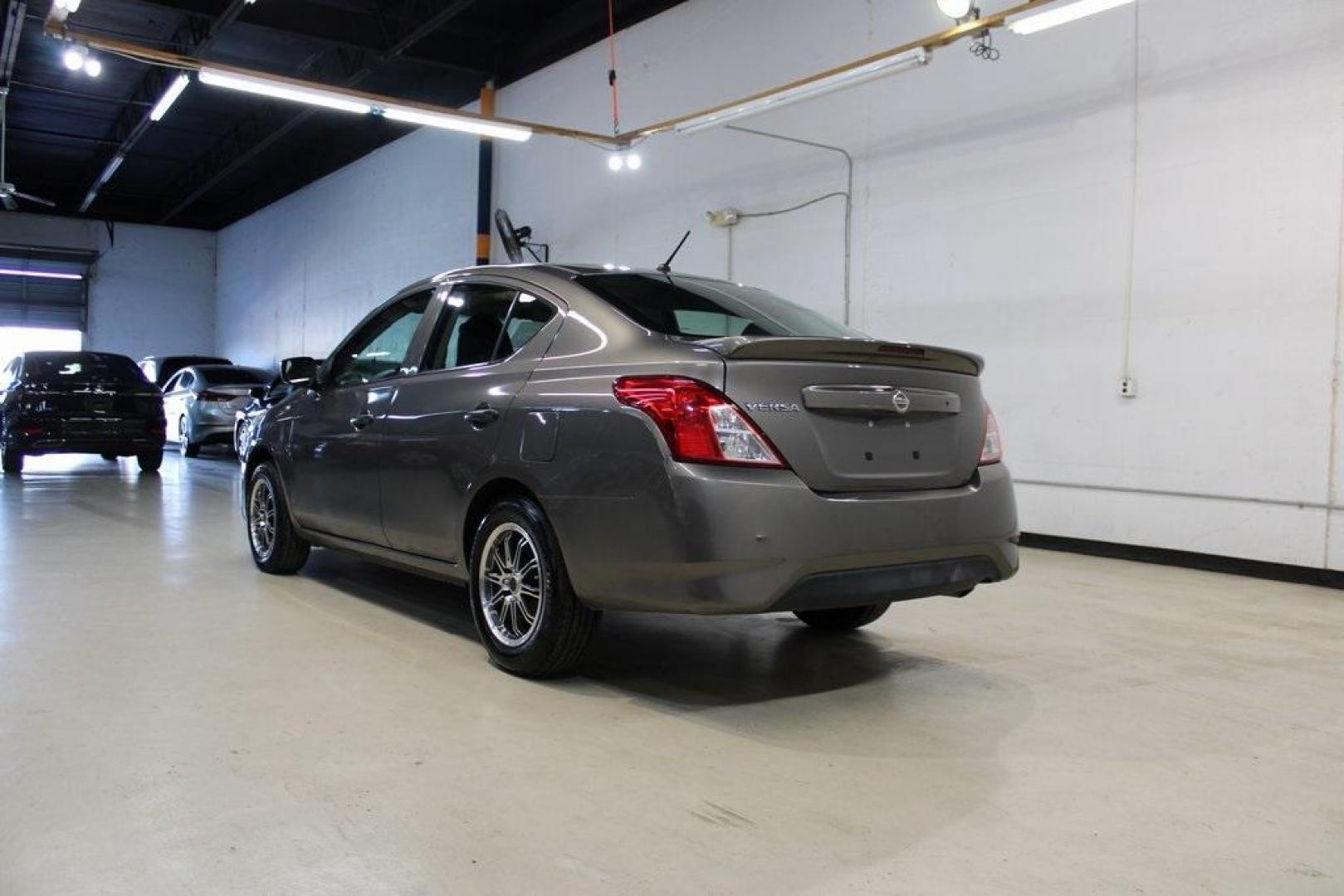 2017 Titanium /Charcoal Nissan Versa 1.6 S Plus (3N1CN7AP9HL) with an 1.6L I4 DOHC 16V engine, CVT transmission, located at 15300 Midway Rd., Addison, TX, 75001, (972) 702-0011, 32.958321, -96.838074 - Photo#5