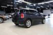 2015 Cosmic Blue Metallic /Carbon Black MINI Cooper Countryman Base (WMWZB3C53FW) with an 1.6L I4 DOHC 16V engine, Automatic transmission, located at 15300 Midway Rd., Addison, TX, 75001, (972) 702-0011, 32.958321, -96.838074 - Photo#2