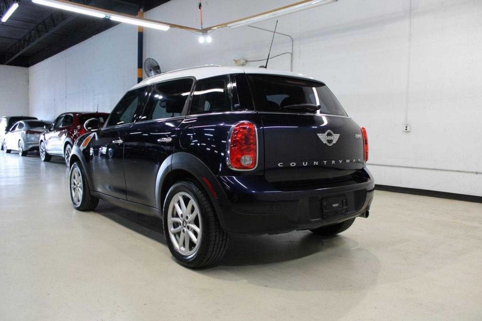 2015 Cosmic Blue Metallic /Carbon Black MINI Cooper Countryman Base (WMWZB3C53FW) with an 1.6L I4 DOHC 16V engine, Automatic transmission, located at 15300 Midway Rd., Addison, TX, 75001, (972) 702-0011, 32.958321, -96.838074 - Photo#3