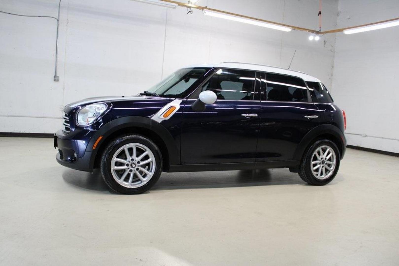 2015 Cosmic Blue Metallic /Carbon Black MINI Cooper Countryman Base (WMWZB3C53FW) with an 1.6L I4 DOHC 16V engine, Automatic transmission, located at 15300 Midway Rd., Addison, TX, 75001, (972) 702-0011, 32.958321, -96.838074 - Photo#4