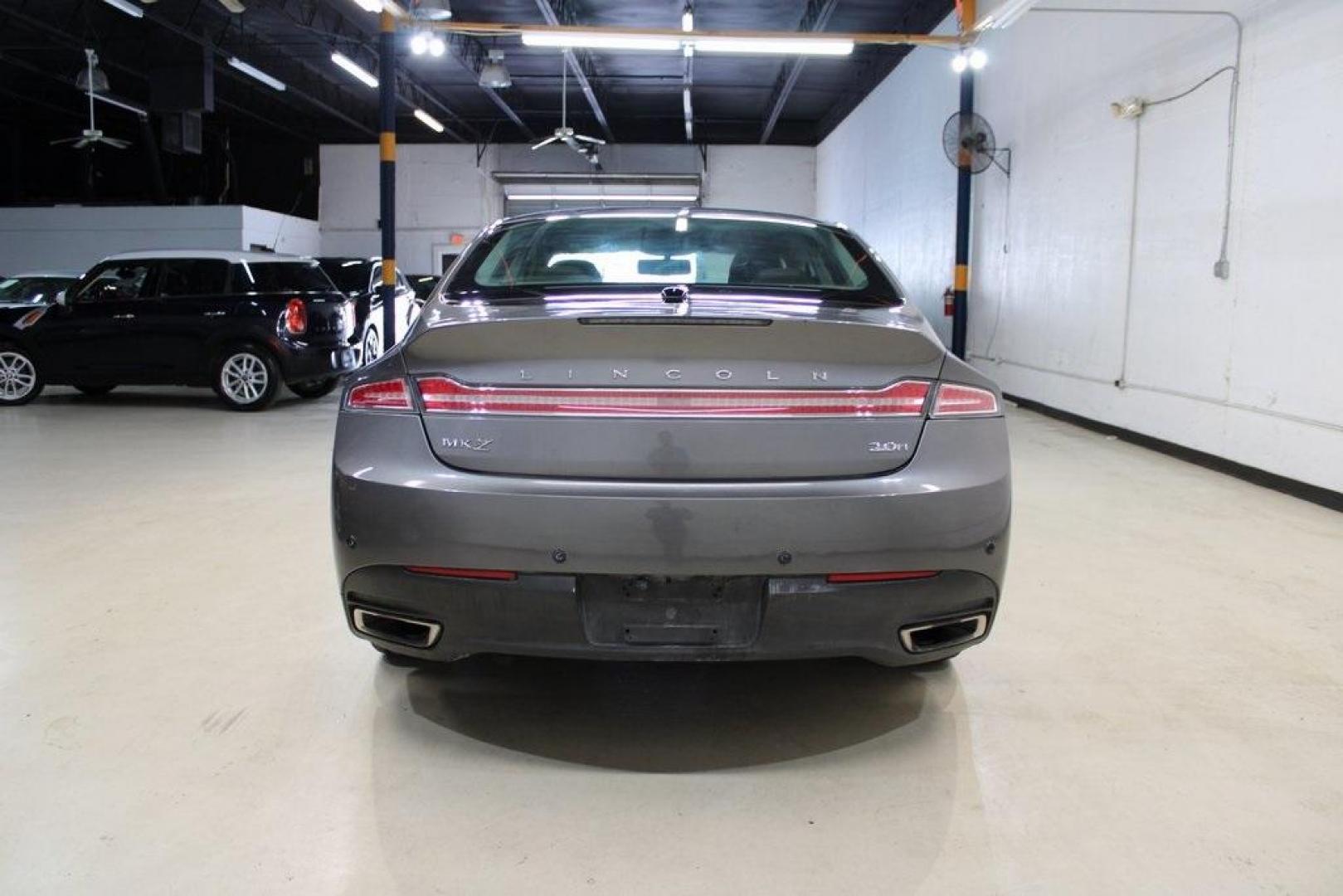 2014 Gray Lincoln MKZ Hybrid (3LN6L2LUXER) with an 2.0L I4 Atkinson-Cycle iVCT engine, CVT transmission, located at 15300 Midway Rd., Addison, TX, 75001, (972) 702-0011, 32.958321, -96.838074 - Photo#1