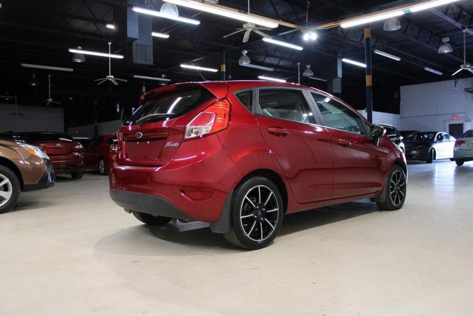 2015 Red Ford Fiesta SE (3FADP4EJ4FM) with an 1.6L I4 Ti-VCT engine, located at 15300 Midway Rd., Addison, TX, 75001, (972) 702-0011, 32.958321, -96.838074 - Photo#1