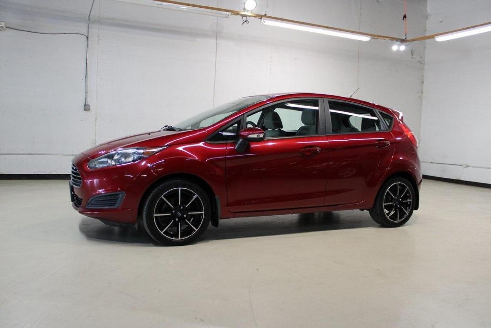 2015 Red Ford Fiesta SE (3FADP4EJ4FM) with an 1.6L I4 Ti-VCT engine, located at 15300 Midway Rd., Addison, TX, 75001, (972) 702-0011, 32.958321, -96.838074 - Photo#3