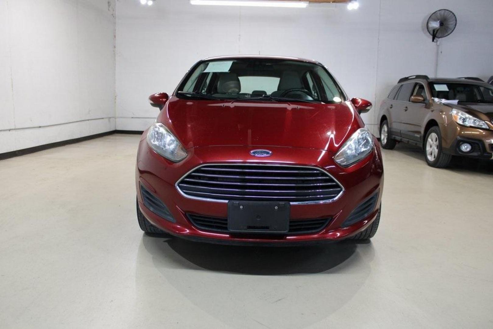 2015 Red Ford Fiesta SE (3FADP4EJ4FM) with an 1.6L I4 Ti-VCT engine, located at 15300 Midway Rd., Addison, TX, 75001, (972) 702-0011, 32.958321, -96.838074 - Photo#4