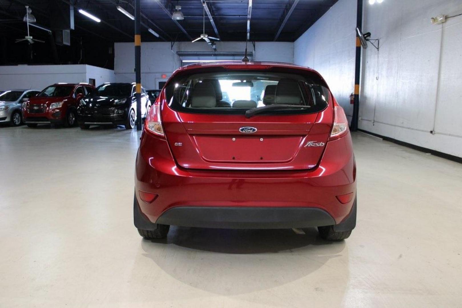 2015 Red Ford Fiesta SE (3FADP4EJ4FM) with an 1.6L I4 Ti-VCT engine, located at 15300 Midway Rd., Addison, TX, 75001, (972) 702-0011, 32.958321, -96.838074 - Photo#6