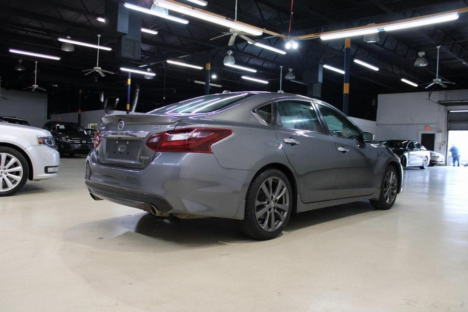 2018 Gun Metallic /Sport Interior Nissan Altima 2.5 SR (1N4AL3AP3JC) with an 2.5L 4-Cylinder DOHC 16V engine, CVT transmission, located at 15300 Midway Rd., Addison, TX, 75001, (972) 702-0011, 32.958321, -96.838074 - Photo#2