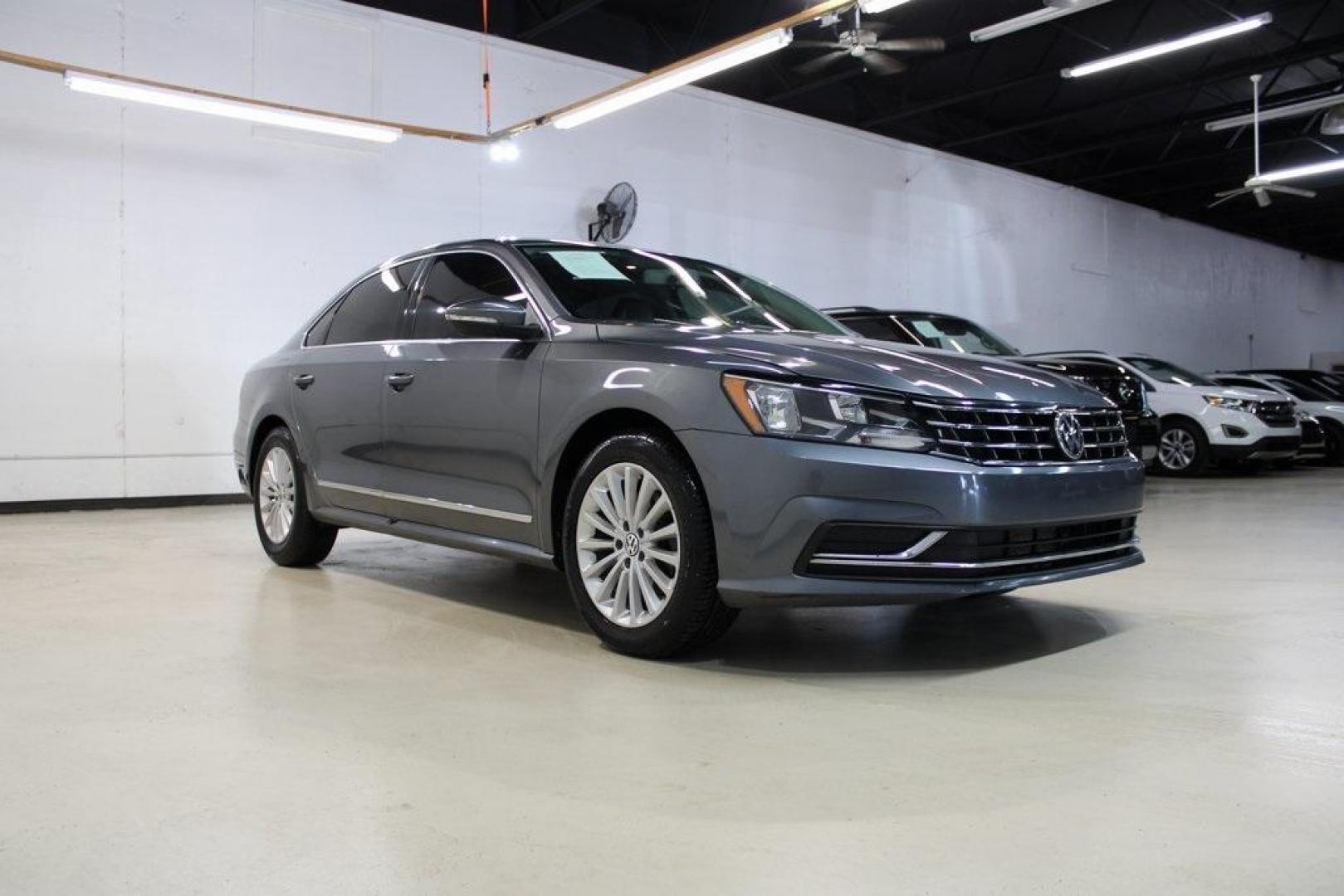 2016 Platinum Gray Metallic Volkswagen Passat 1.8T SE (1VWBT7A35GC) with an 1.8L TSI engine, Automatic transmission, located at 15300 Midway Rd., Addison, TX, 75001, (972) 702-0011, 32.958321, -96.838074 - Photo#1