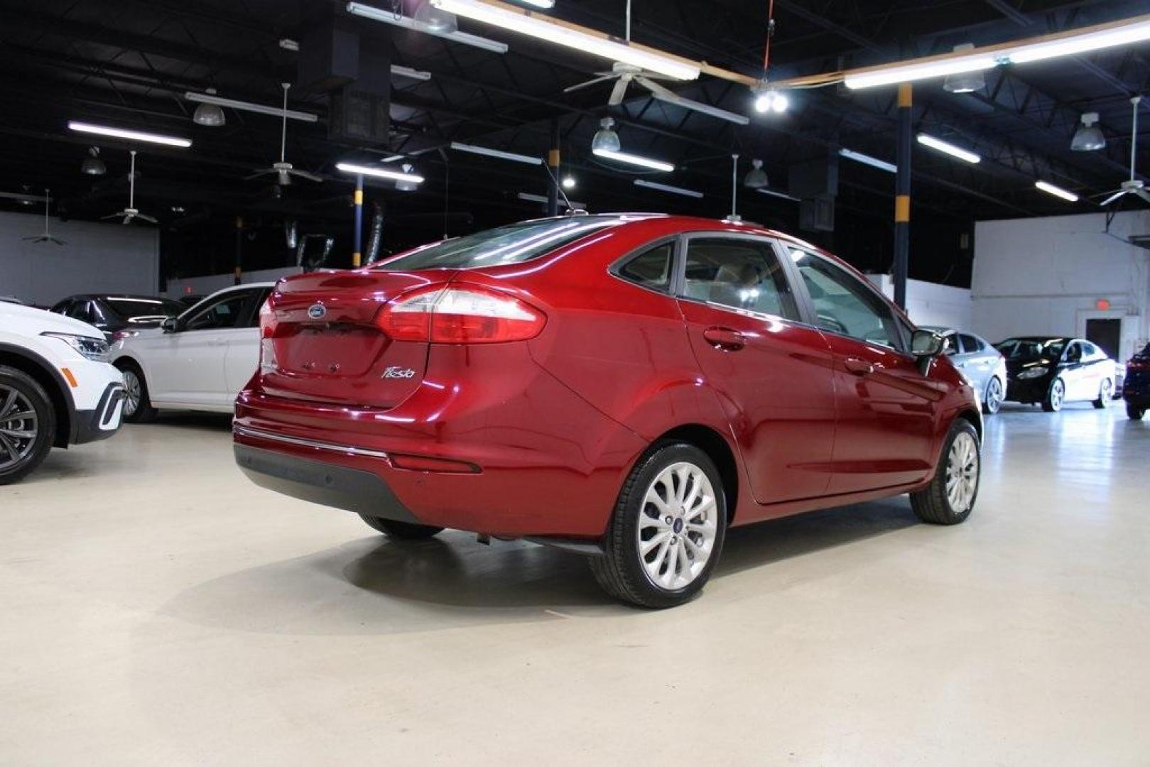 2017 Ruby Red Metallic Tinted Clearcoat Ford Fiesta Titanium (3FADP4CJ8HM) with an 1.6L I4 Ti-VCT engine, Automatic transmission, located at 15300 Midway Rd., Addison, TX, 75001, (972) 702-0011, 32.958321, -96.838074 - Photo#2