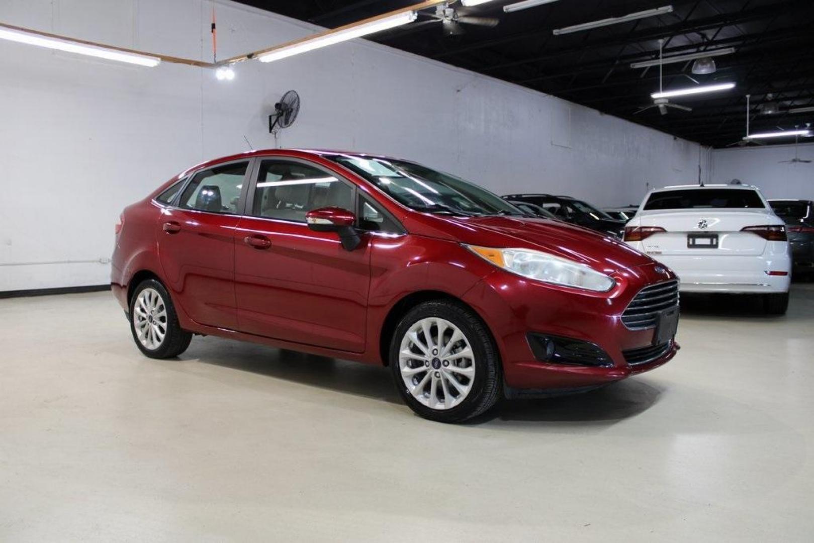 2017 Ruby Red Metallic Tinted Clearcoat Ford Fiesta Titanium (3FADP4CJ8HM) with an 1.6L I4 Ti-VCT engine, Automatic transmission, located at 15300 Midway Rd., Addison, TX, 75001, (972) 702-0011, 32.958321, -96.838074 - Photo#6